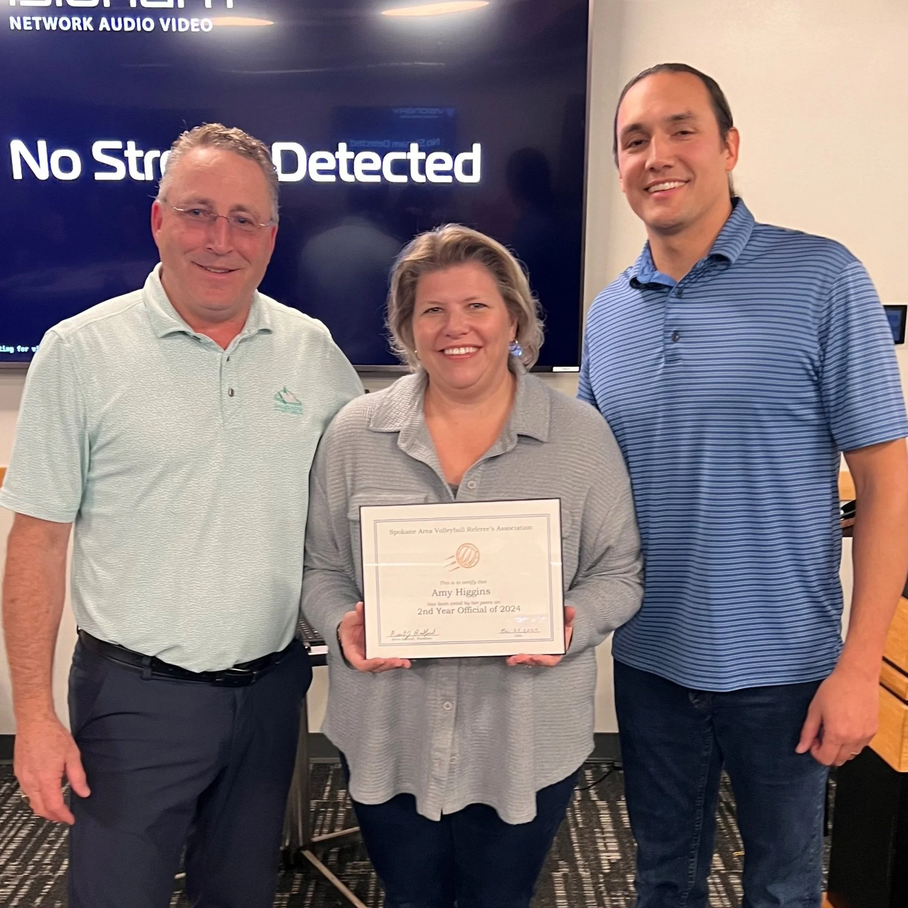 Awarded best second-year official was Amy Higgins (Center)