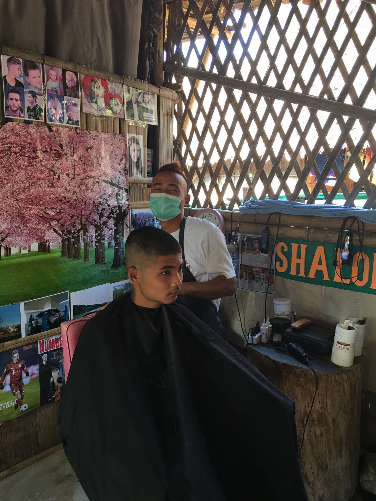 Paul in his salon in Nu Po Refugee Camp