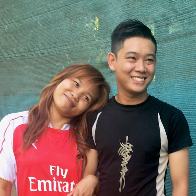 San San Myint and her husband with his haircut by Mackenzie.