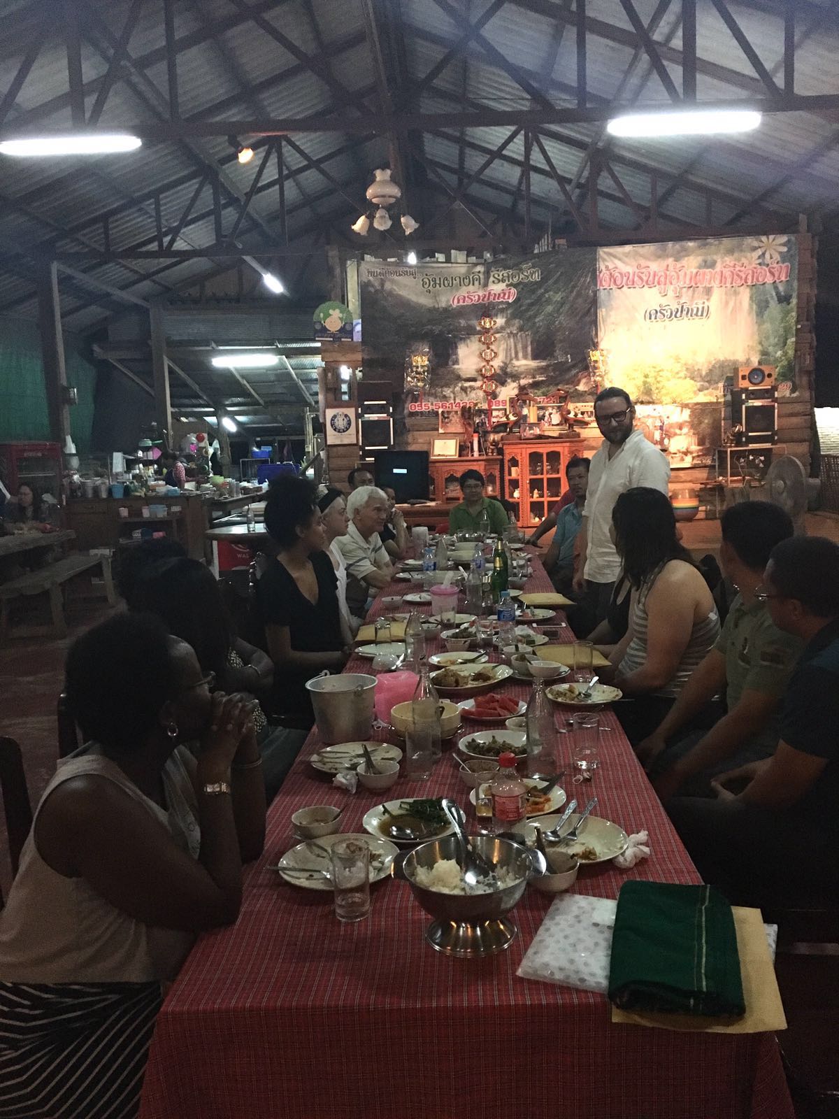 Charlie thanks everyone at the table in three languages: English, Burmese, and Karen!