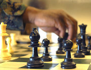 Chess+pic+with+hand.jpeg