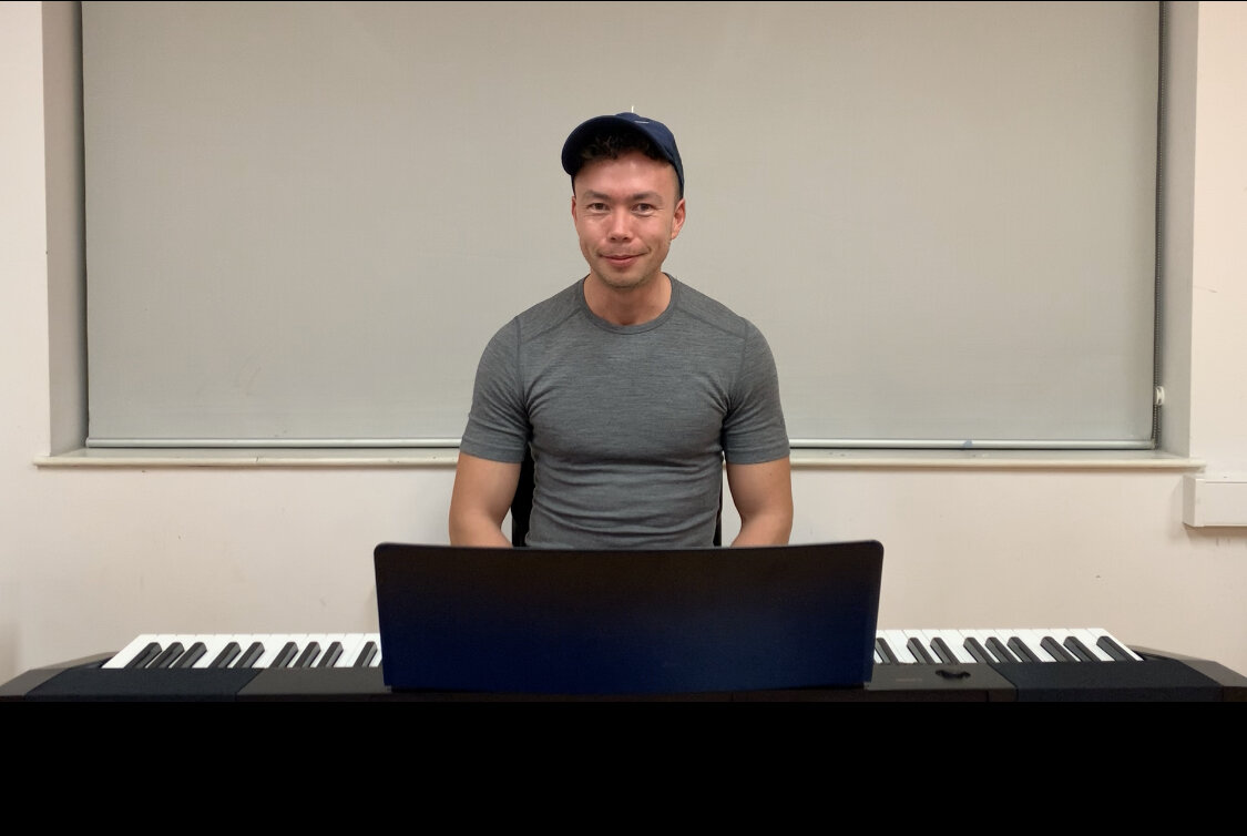 Patrick Jeremy Coaching at Piano.jpg