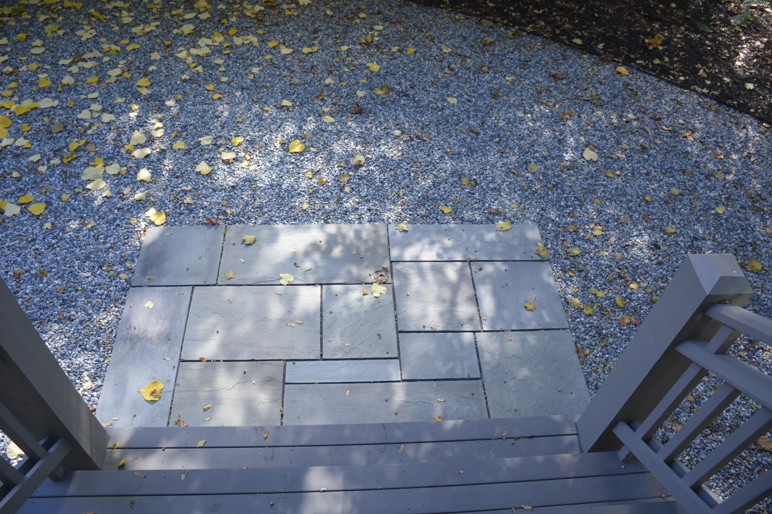  Blue stone landing and pea stone patio 