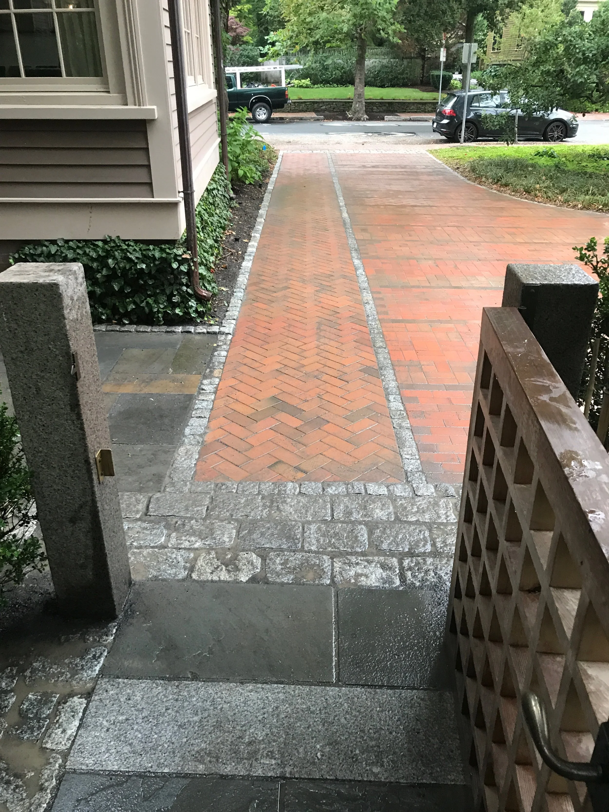 Herringbone brick path along driveway with cobbles, blue stone and granite walkway 
