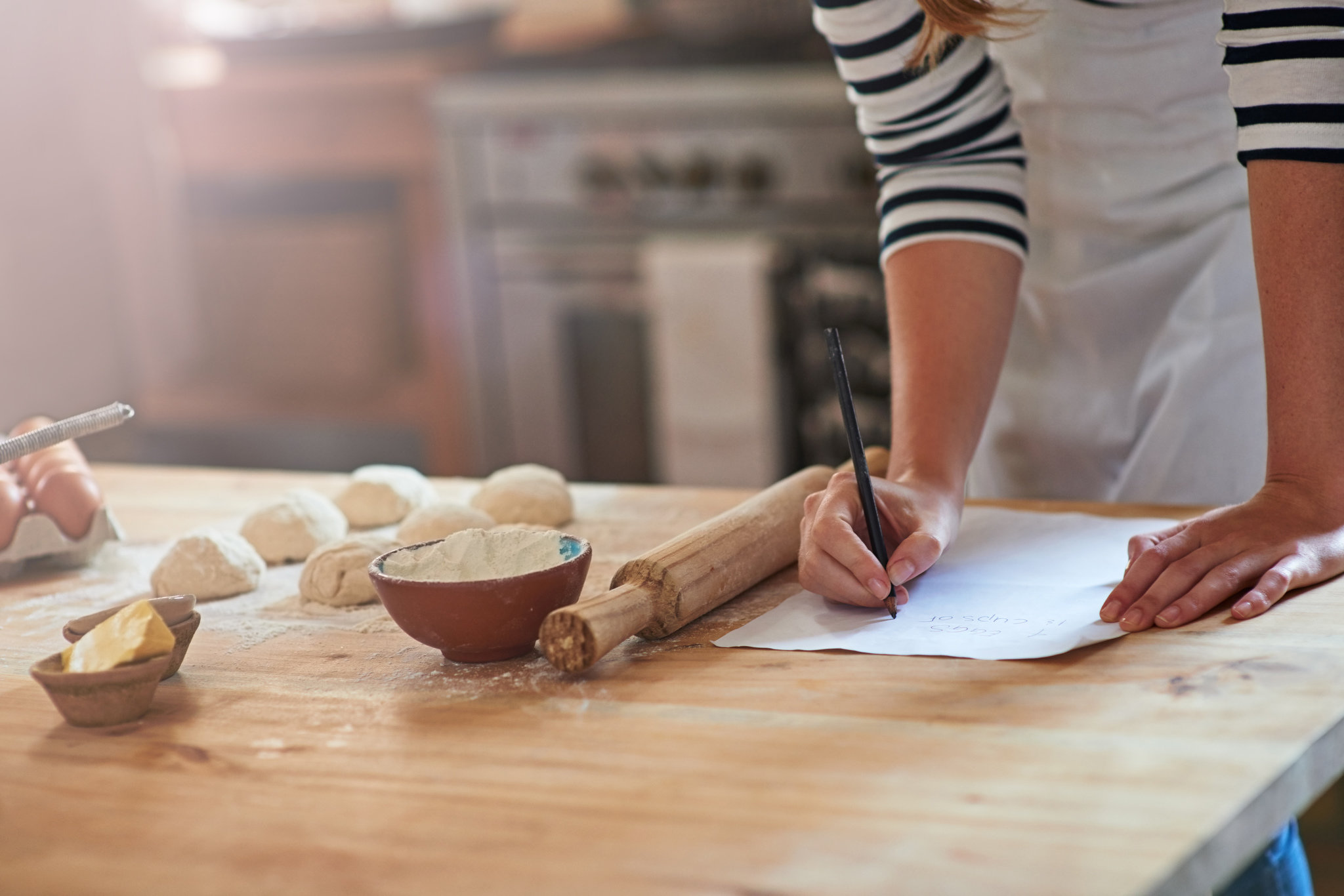 woman-writing-recipe-a3afbc407dadbb24.jpg