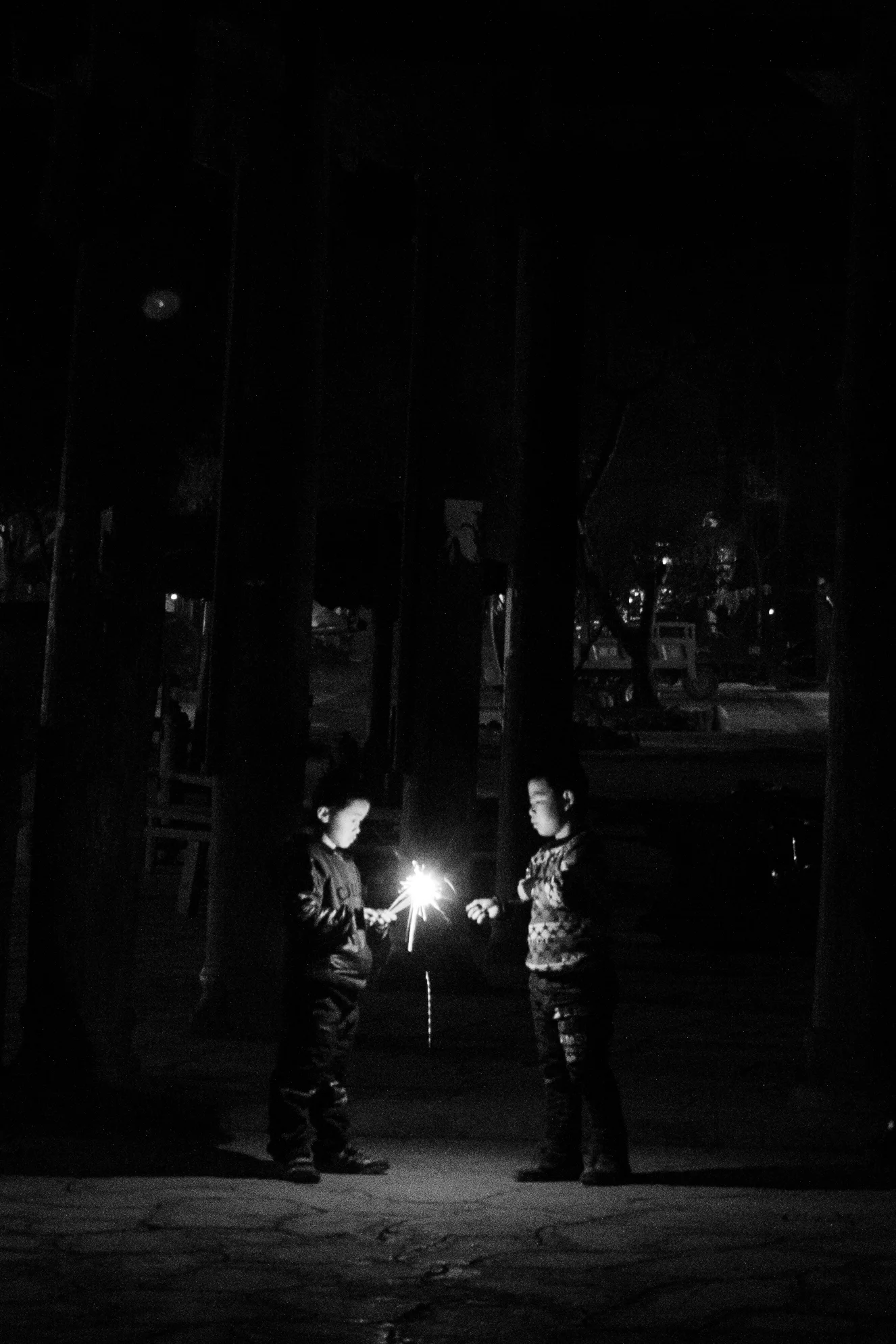 boys playing with fireworks.jpg