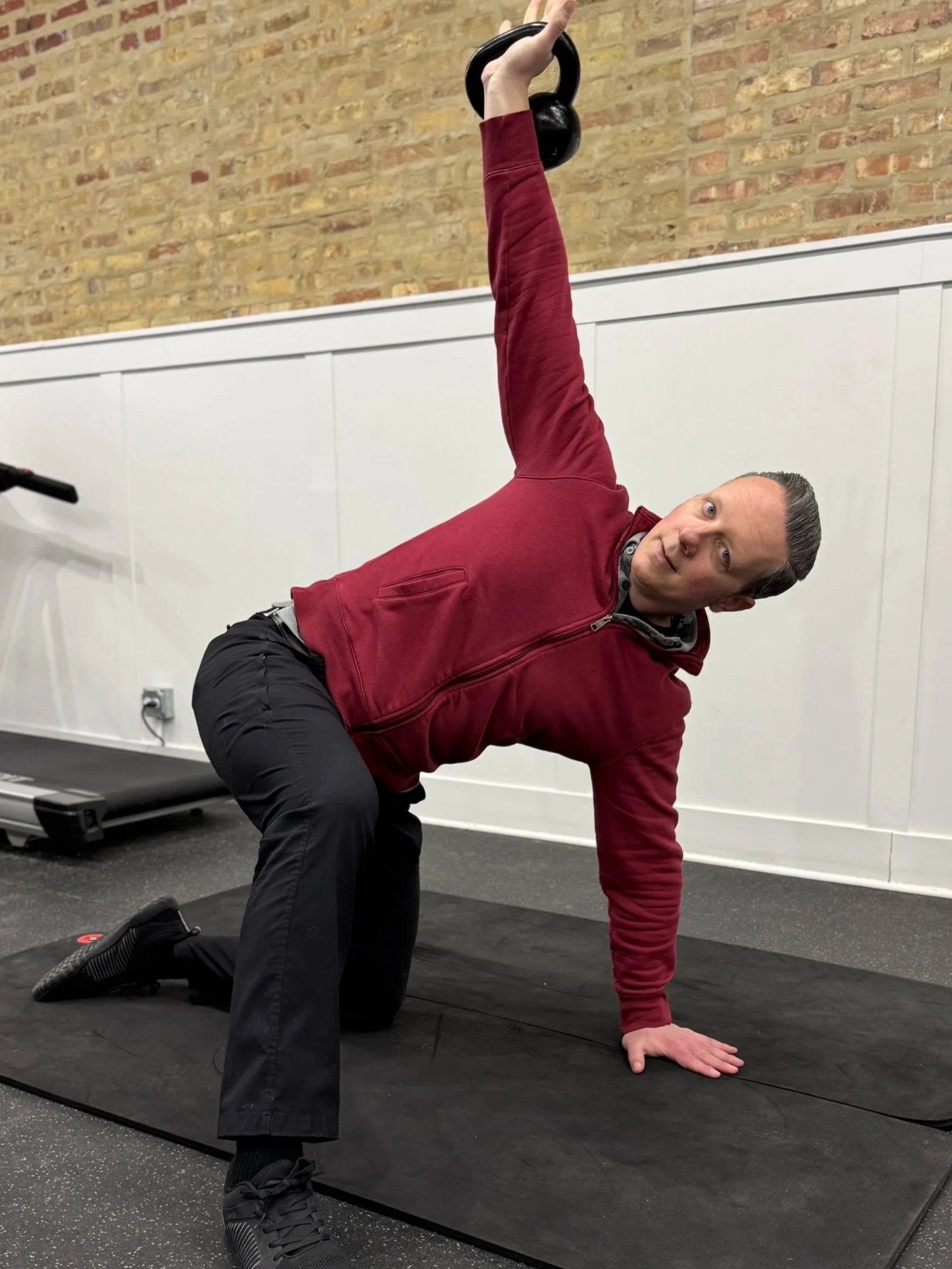 Dr. Adam Bruene demonstrating a movement exercise