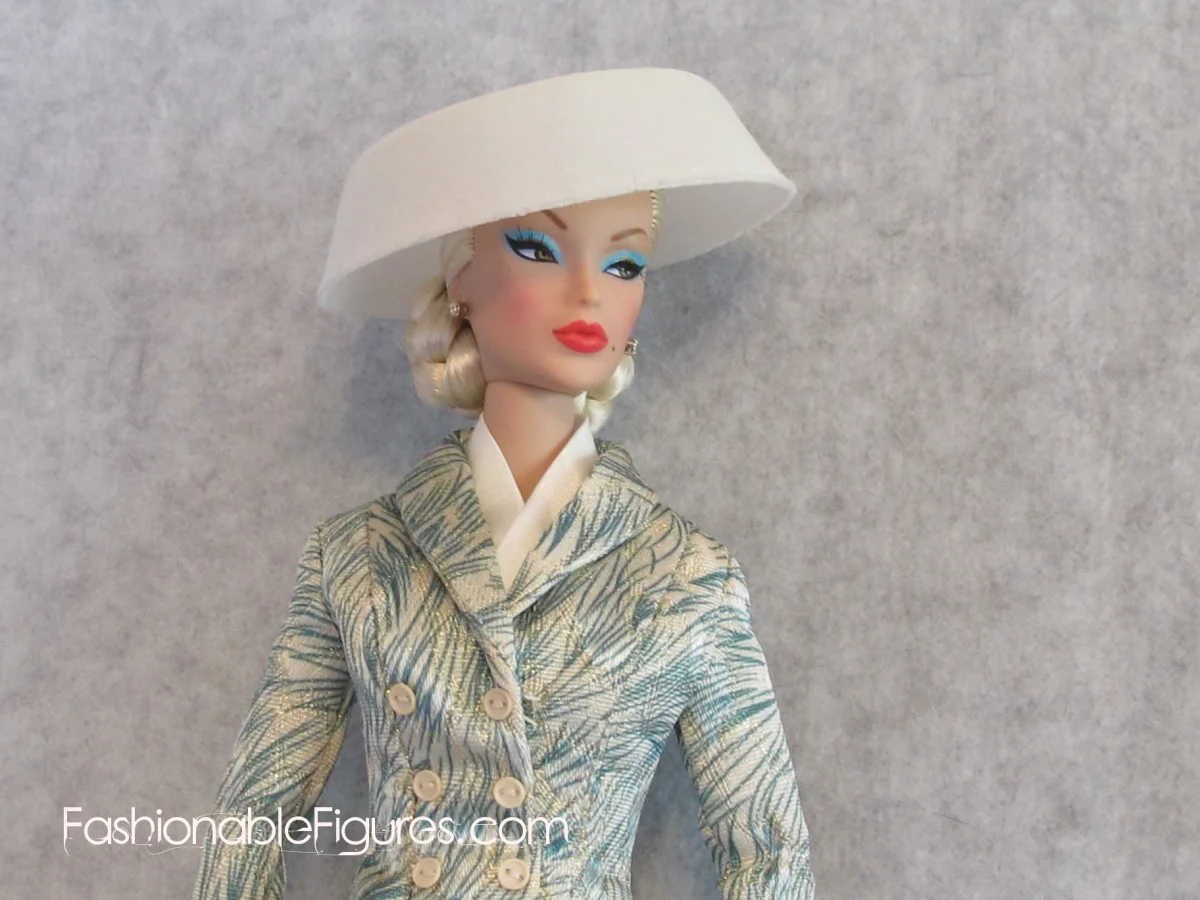 Profile pic of doll in hat