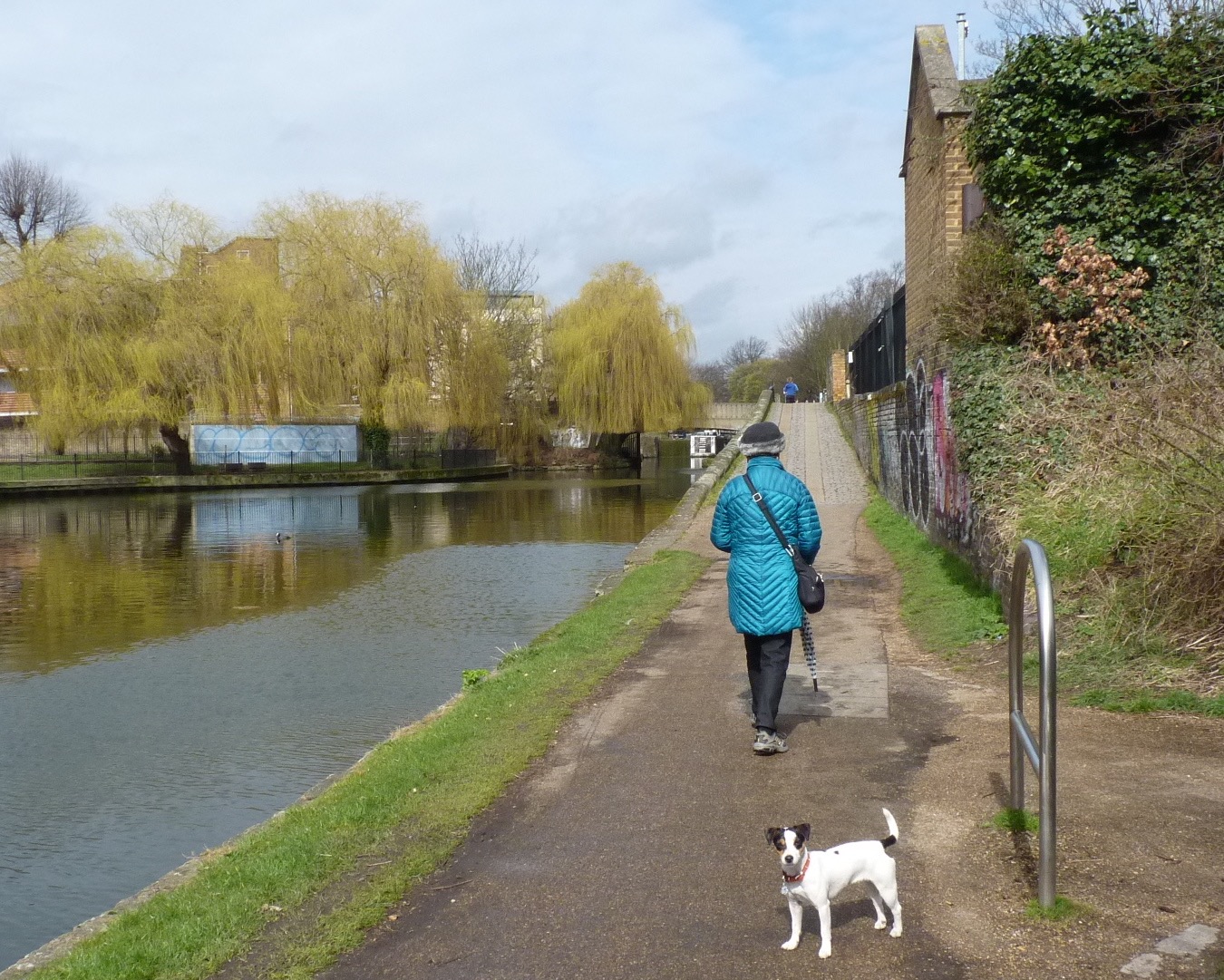 Here is a picture of the canals I walk down every day. They even have boats that people live on!