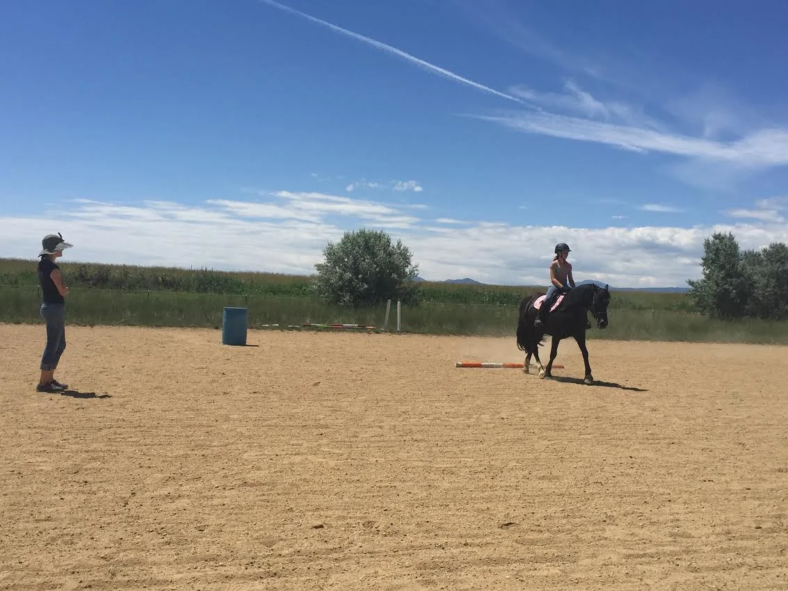 Cathy Lauderbaugh teaches horseback riding lessons in Boulder County, Colorado.