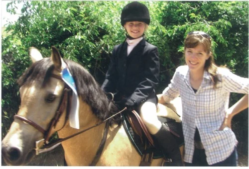 Cathy Lauderbaugh teaches horseback riding lessons for children and adults in Boulder County Colorado.