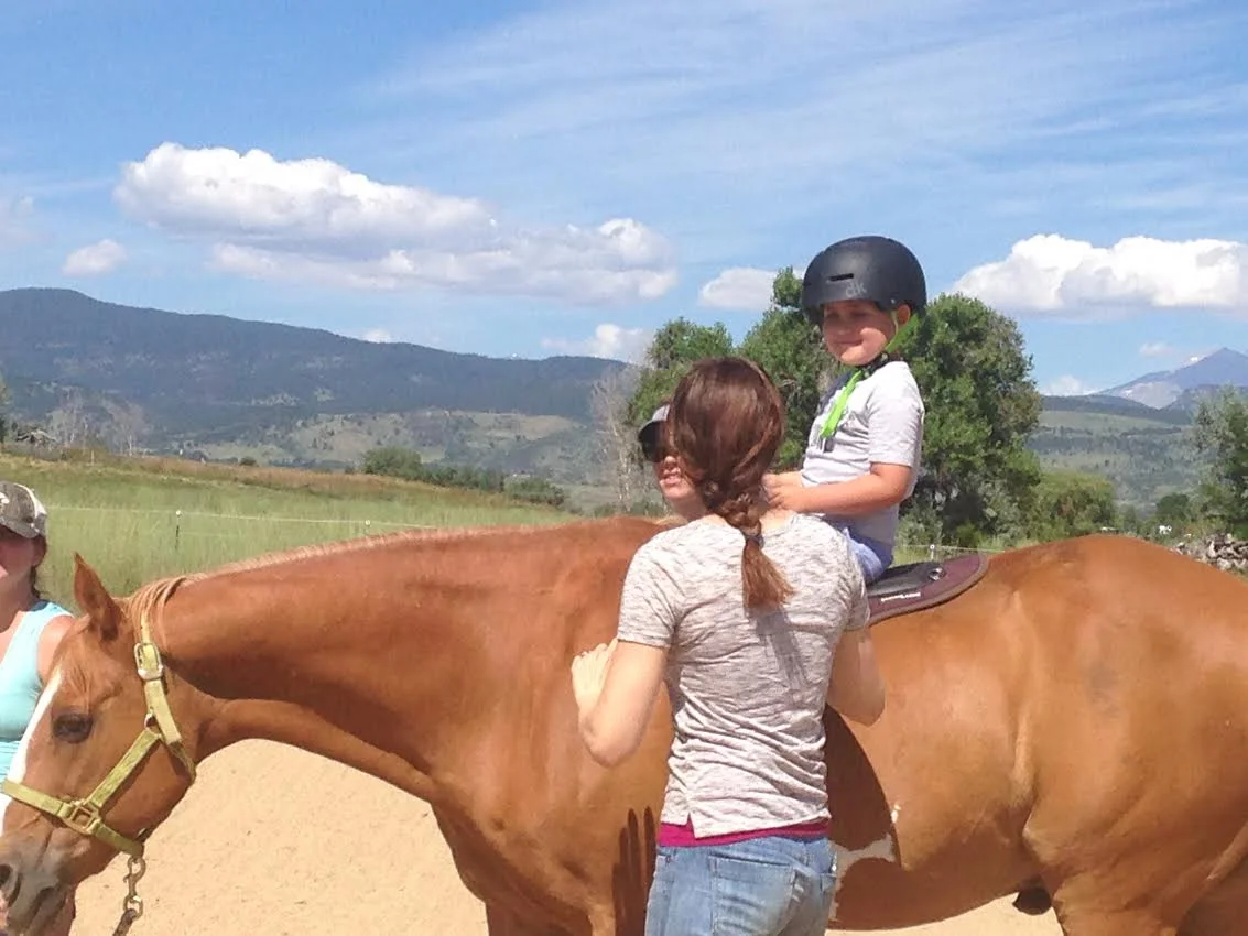 Cathy Lauderbaugh offers hippotherapy to support pediatric speech and language therapy goals, in Boulder County, Colorado.