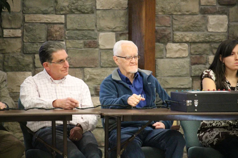 Dick participating in the faculty v. students Bible quiz