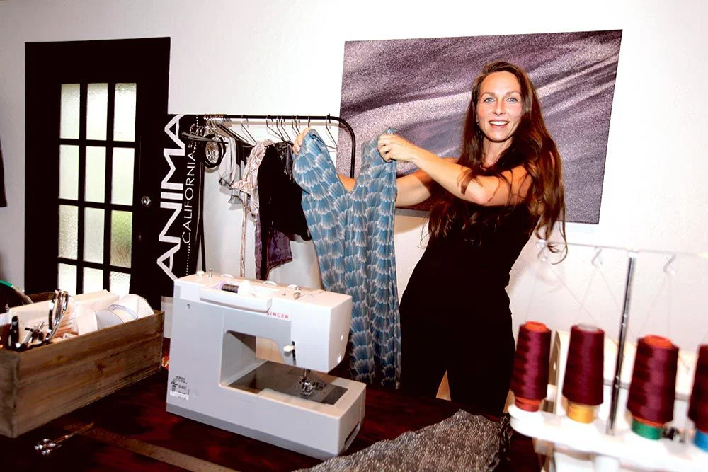 Designer Jessica Neafsey makes patterns inspired by Central Coast wildlife, like this Scrub Jay dress. Photo by Nic Coury, Monterey County Weekly