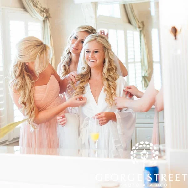 If a 'reveal shot' is not what you had in mind, perhaps a 'primping shot' would be better for you