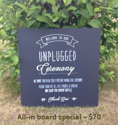 Calgary chalkboard artist created wedding decor for unplugged wedding or ceremony. Done by chalkboards and company
