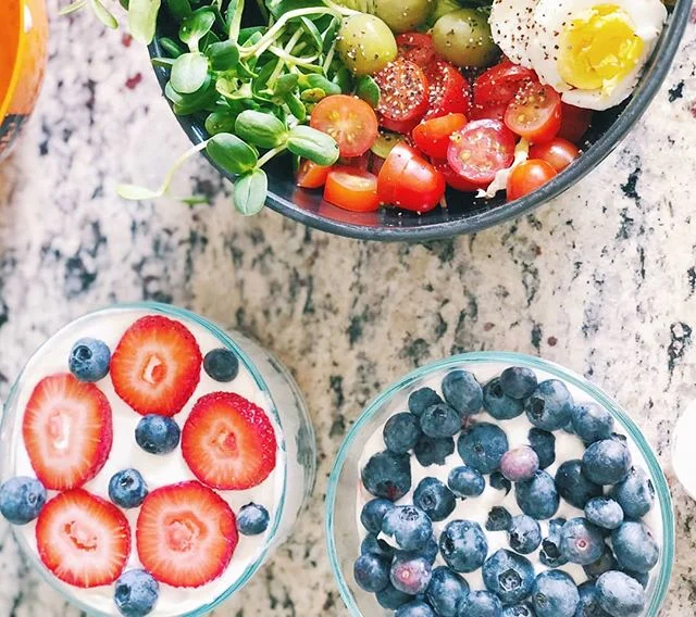 Prepping for July 4th with red, white and blue @kitehillfoods yogurt parfait's. Super easy to make. I layer mine with @lilys_sweets sugar free chocolate chips and in this case blueberries and strawberries. You can also top it with @so_delicious vegan