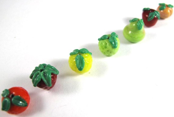 Set of Seven Handmade Glass Fruit Beads Including a Pear and a Strawberry  and a Lemon and a Lime and a Peach — The Glass Studio
