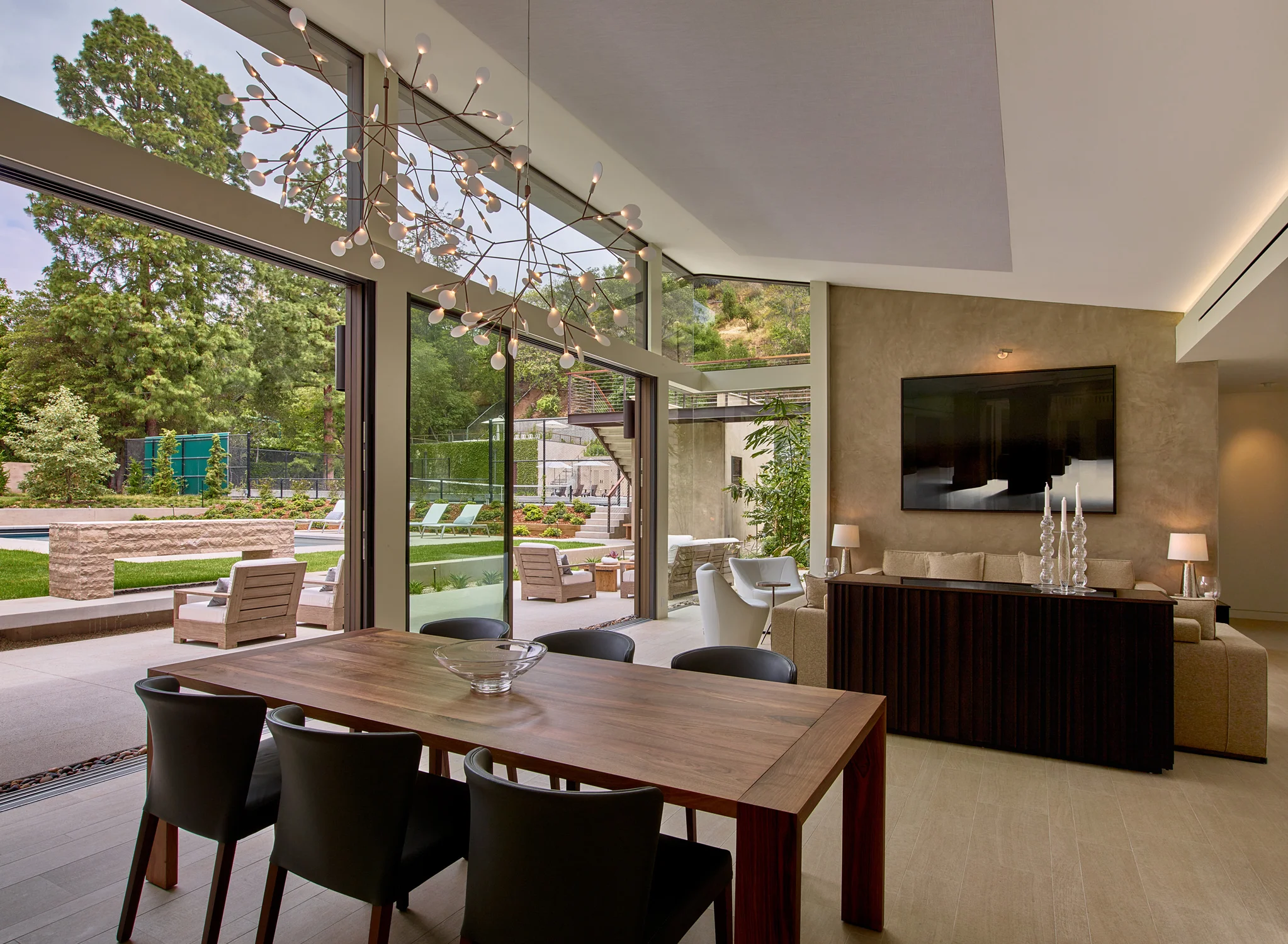   PALISADES CABINETS    Ebonized oak credenza and side tables with glass tops for custom home by the  Dunsmuir Institute Architects .  