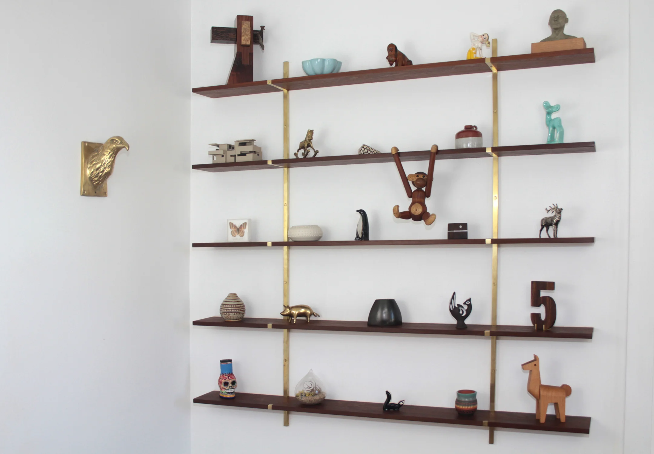   THE COLLECTOR'S SHELF   Petite display shelf in ipé and solid brass. 