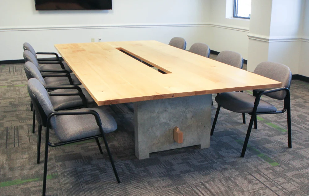   FedEx CONFERENCE TABLE    Over-sized trestle conference table in maple and concrete.&nbsp;  