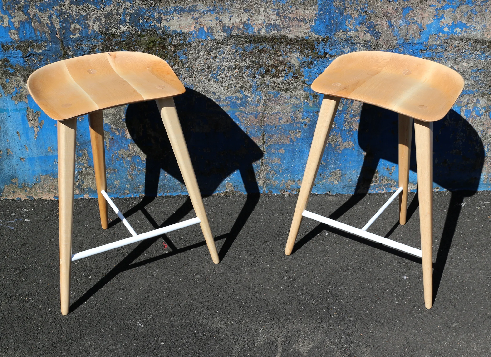   OREGON BAR STOOL   Hand-carved bar stools in maple and powder coated steel. 