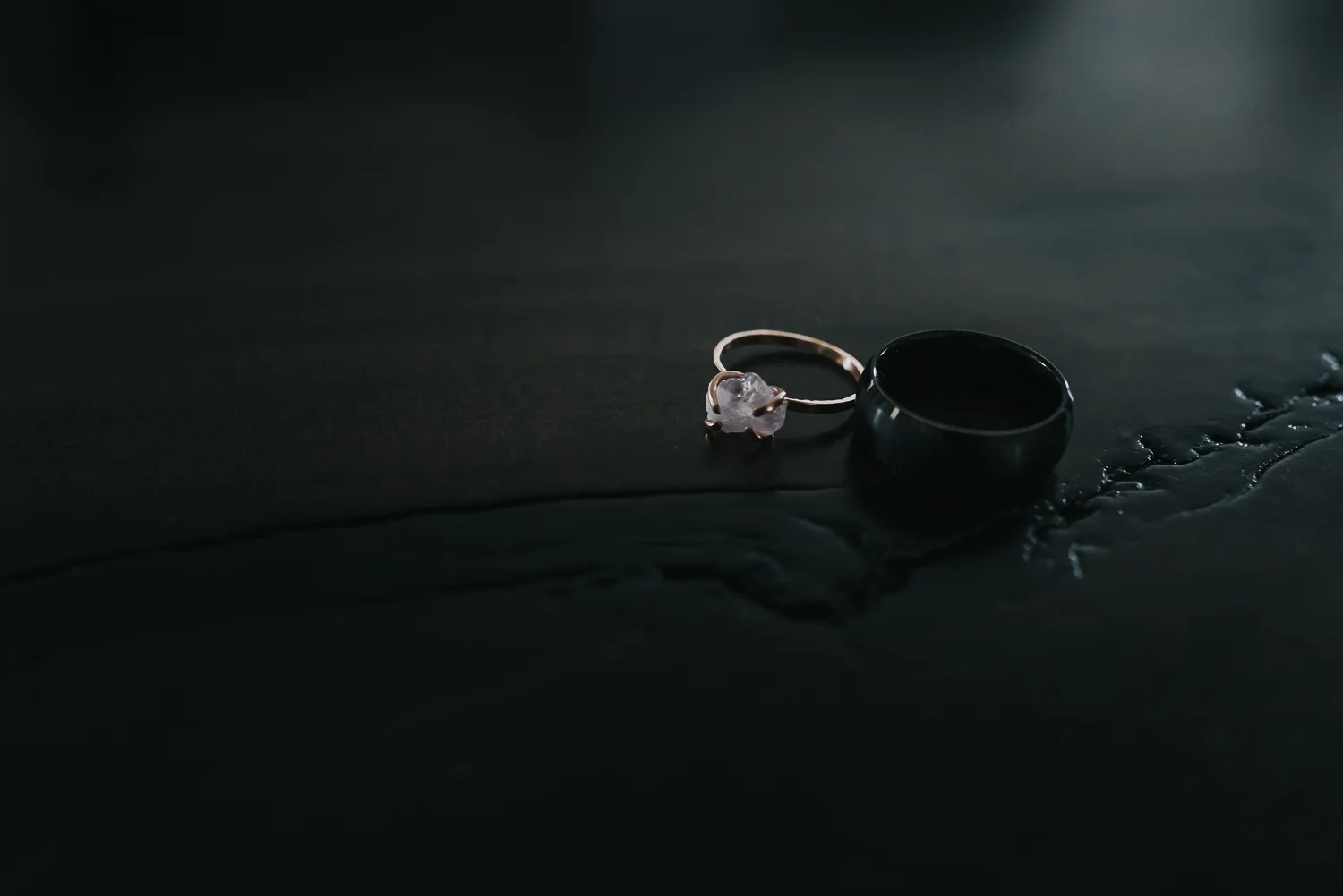 Wedding bands rose gold with rough cut amethyst and titanium