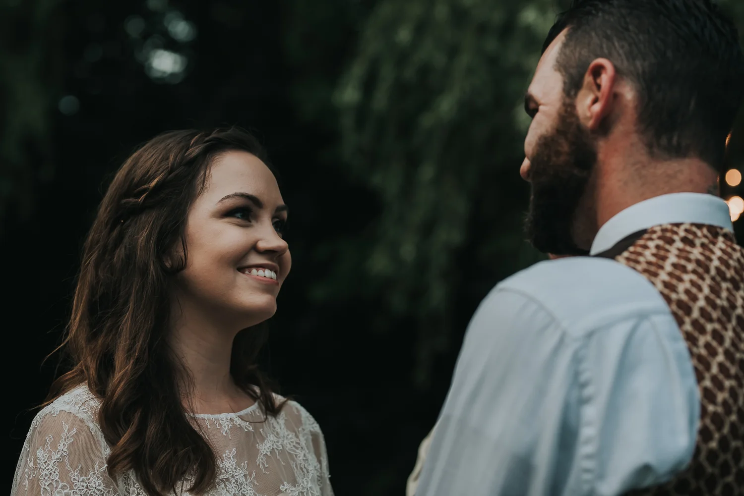 Bride looking lovingly at her soon to be husband