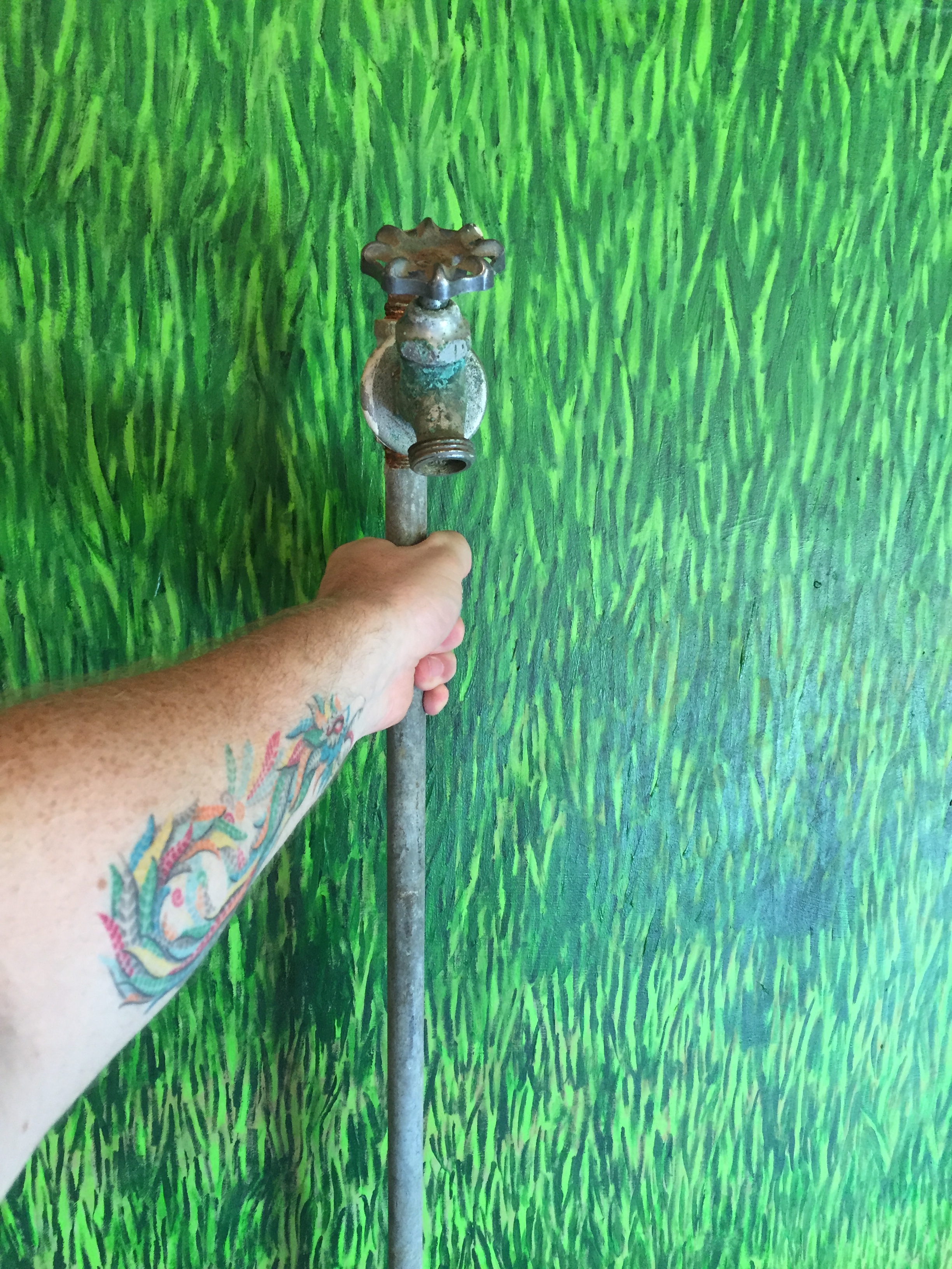 Sizing the up the faucet and grass piece.