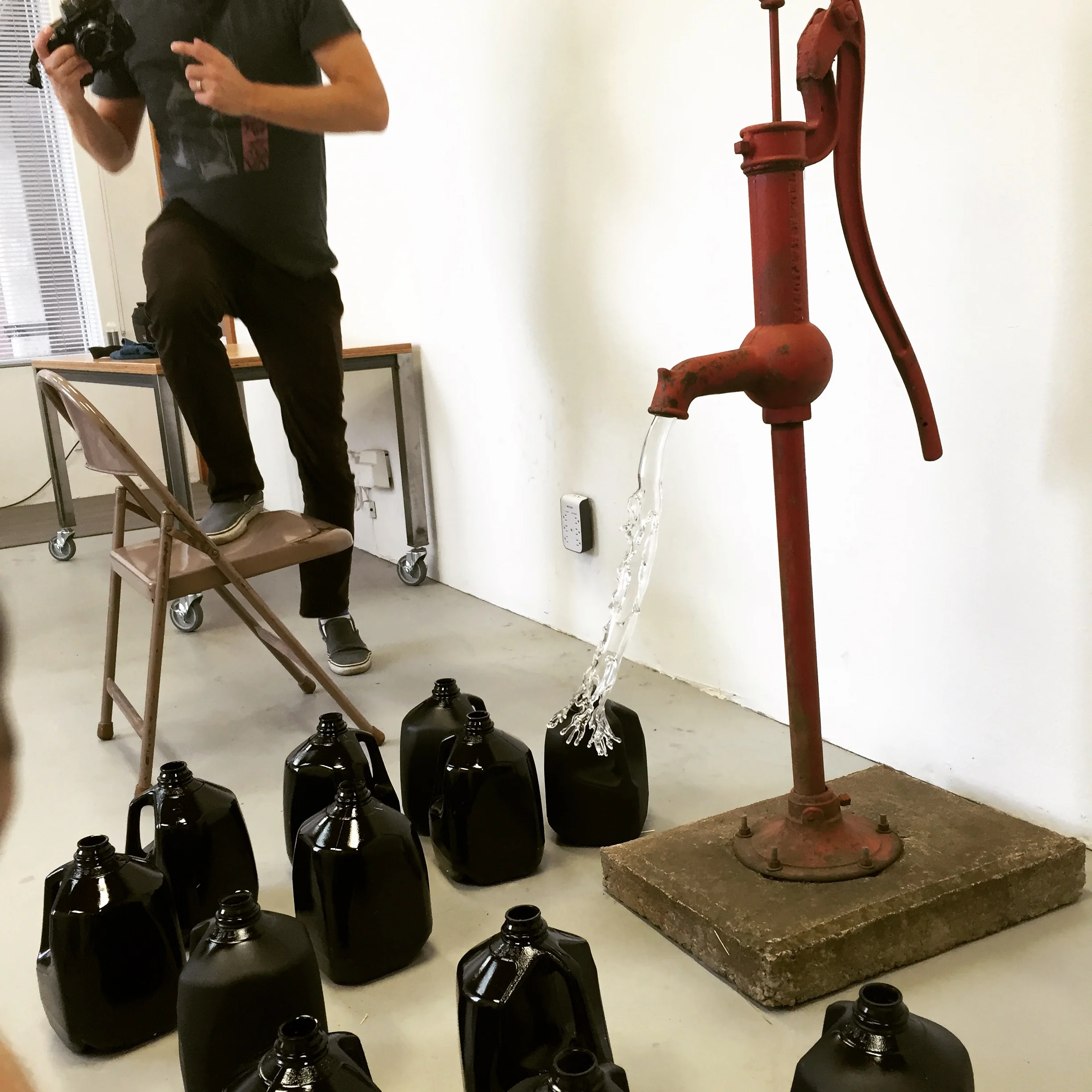 Setting up and photographing the installation.