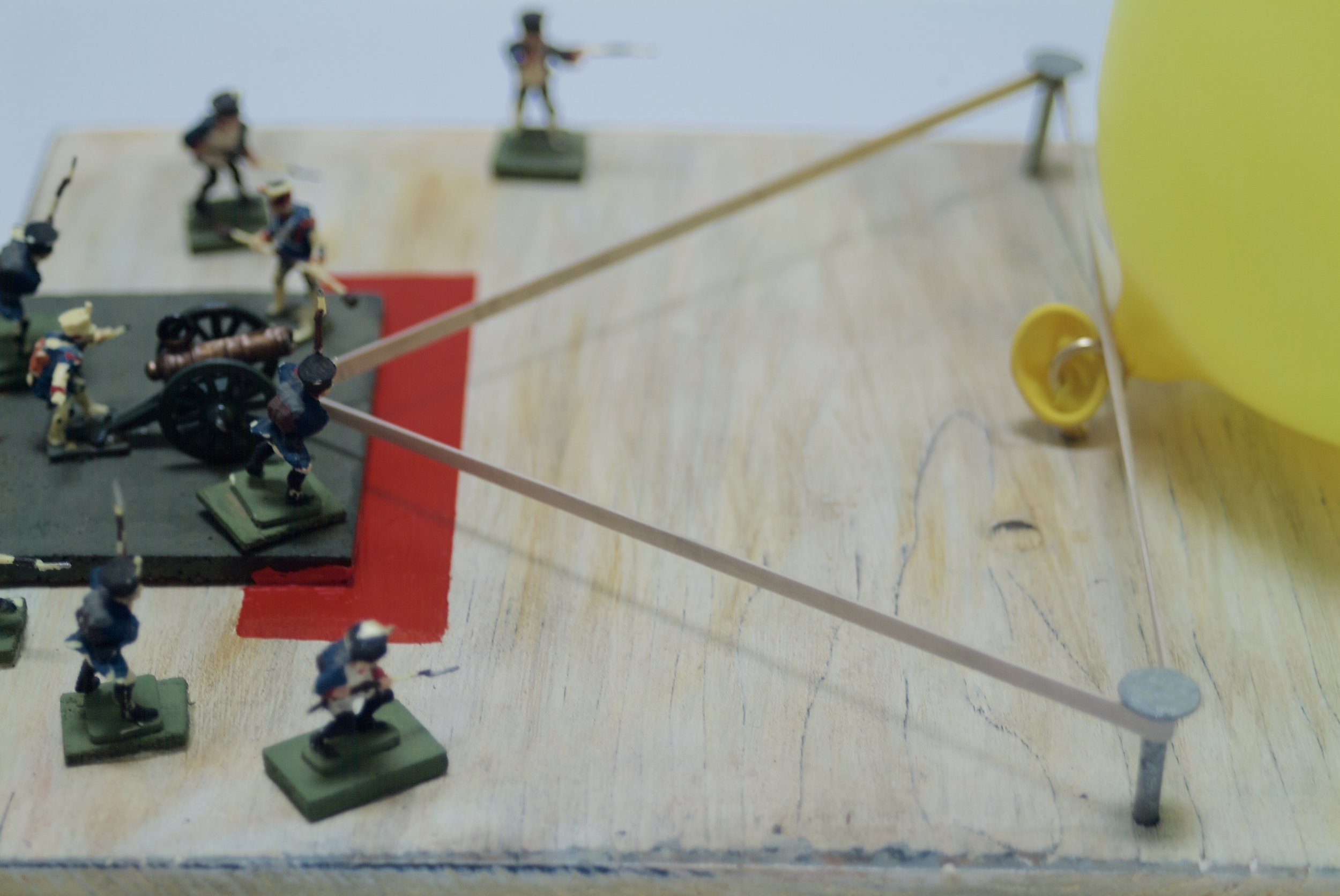 This particular piece references the idea of games in general; war games, board games, and sports.