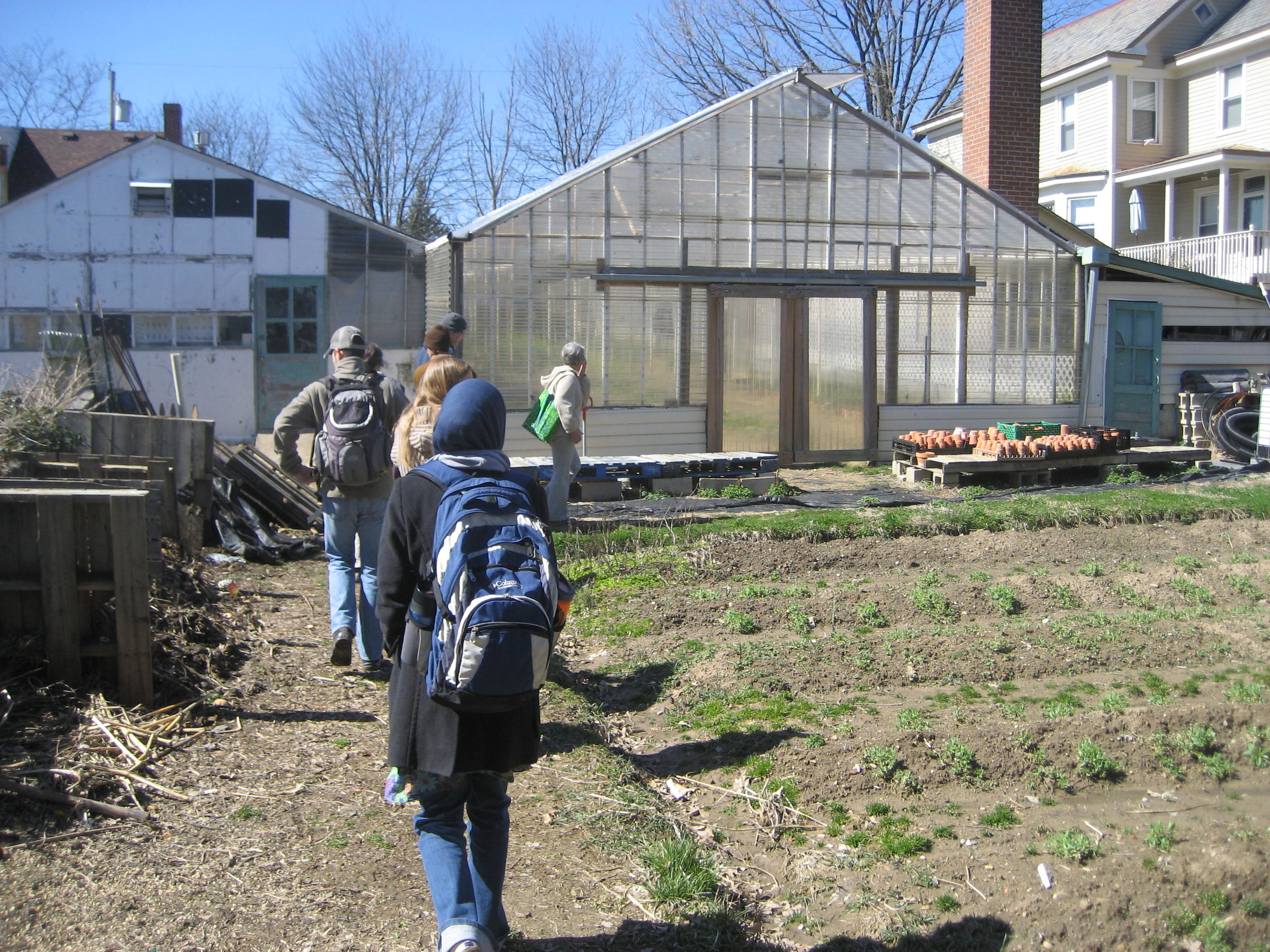Students getting a tour of the Enright Ridge CSA Greenhouse