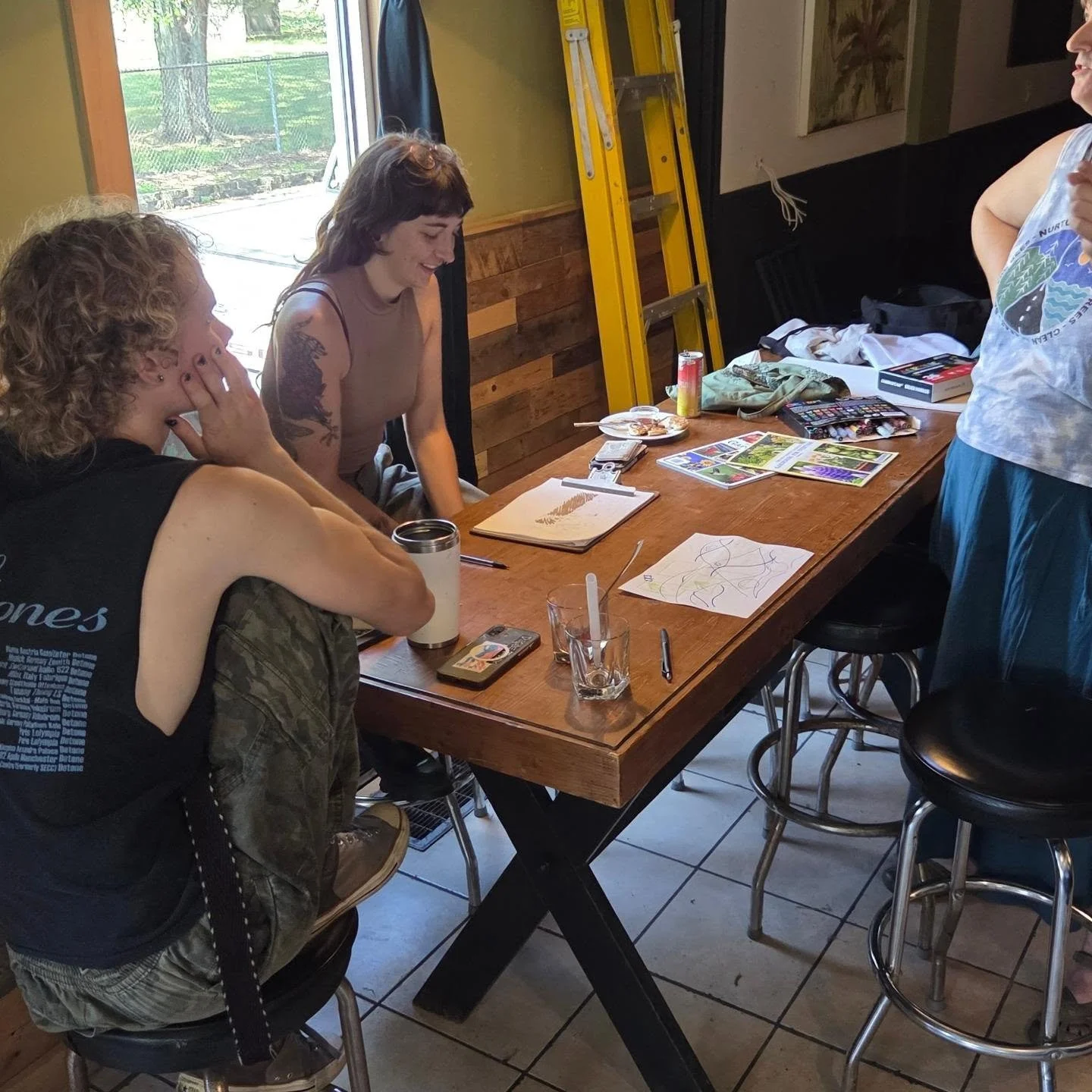 Yesterday turned into an "arts and crafts" day at the Corner Commons as we brainstormed ideas for beautification ahead of our October 3 Homecoming Party and tackled some needed repairs, inside and out. It's so energizing to see this place c