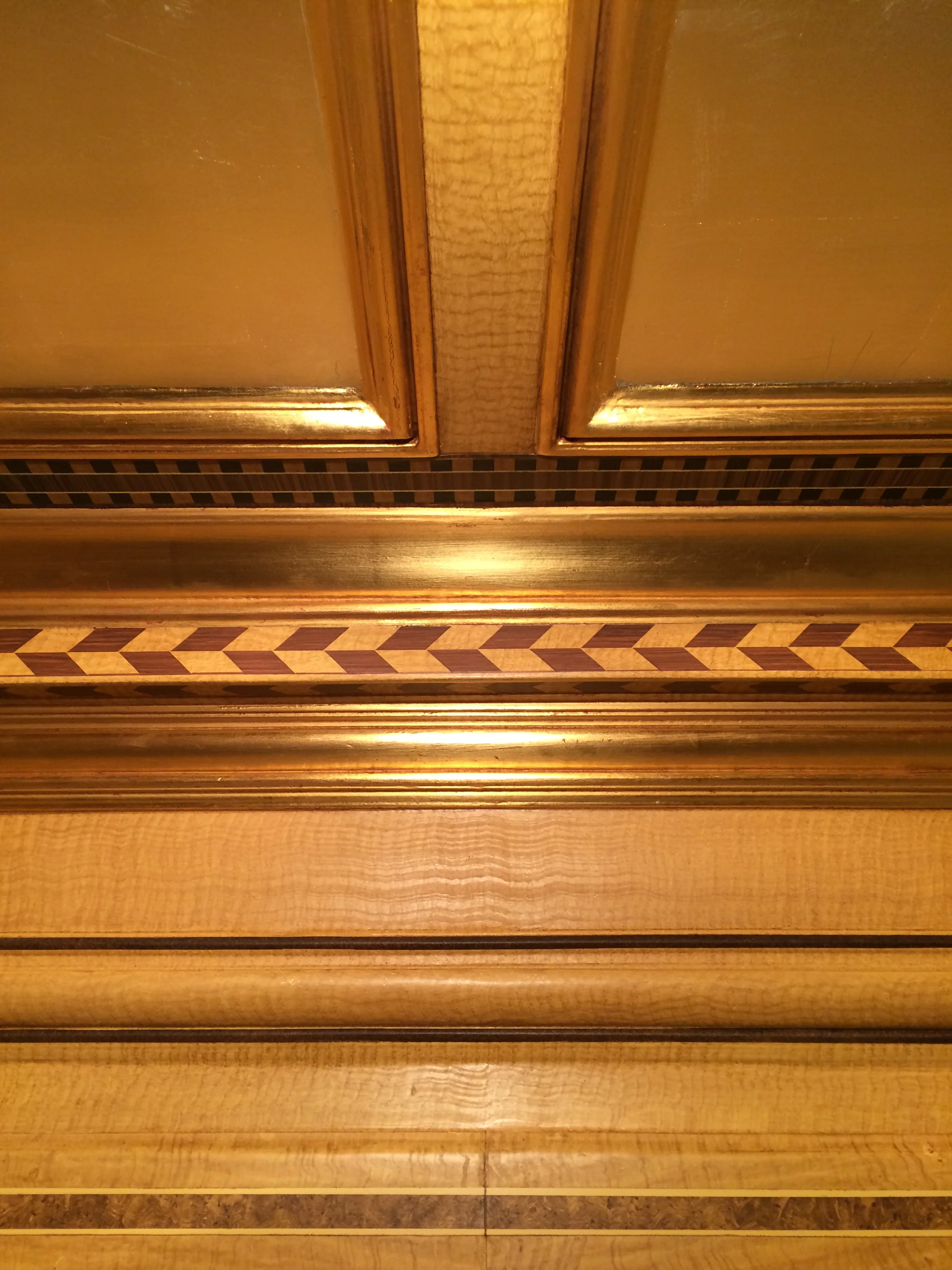   ROSE WOOD MAPLE AND GOLD LEAF MARQUETRY   Design by: Tucker &amp; Marks  Photography: Matthew Millman 