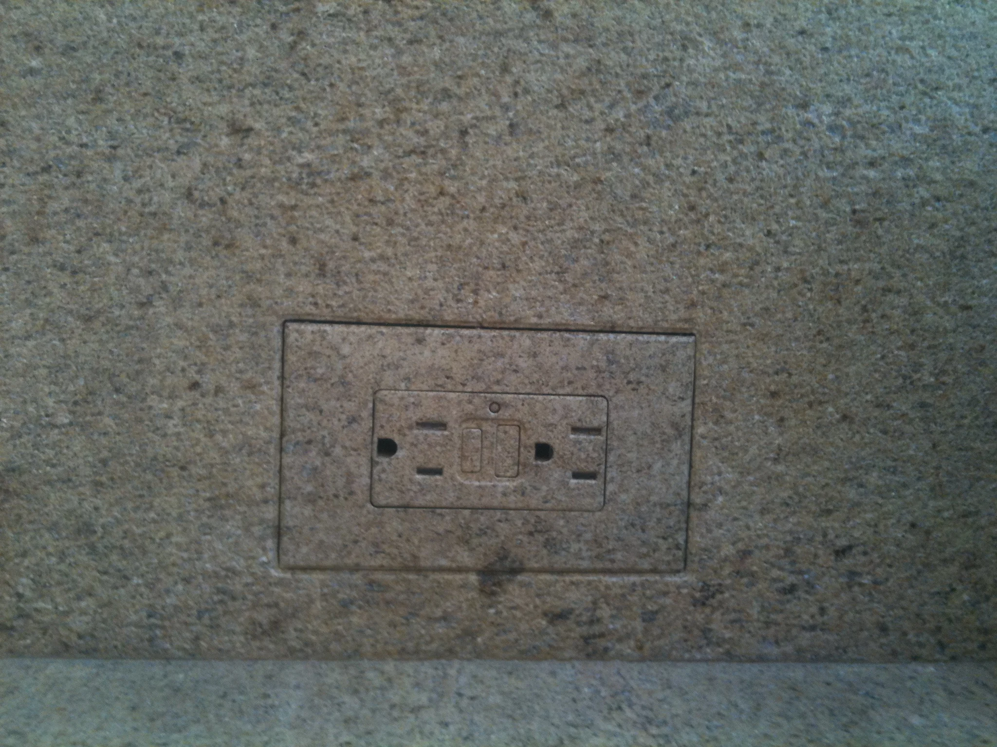   ELECTRIC OUTLET PAINTED TO MATCH GRANITE  