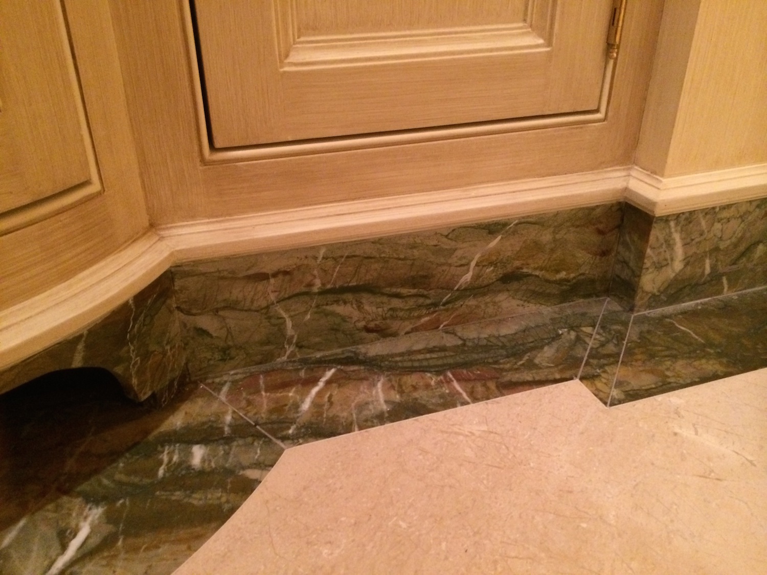   BASE BOARD IN FAUX MARBLE TO MATCH EXISTING FLOOR MARBLE  