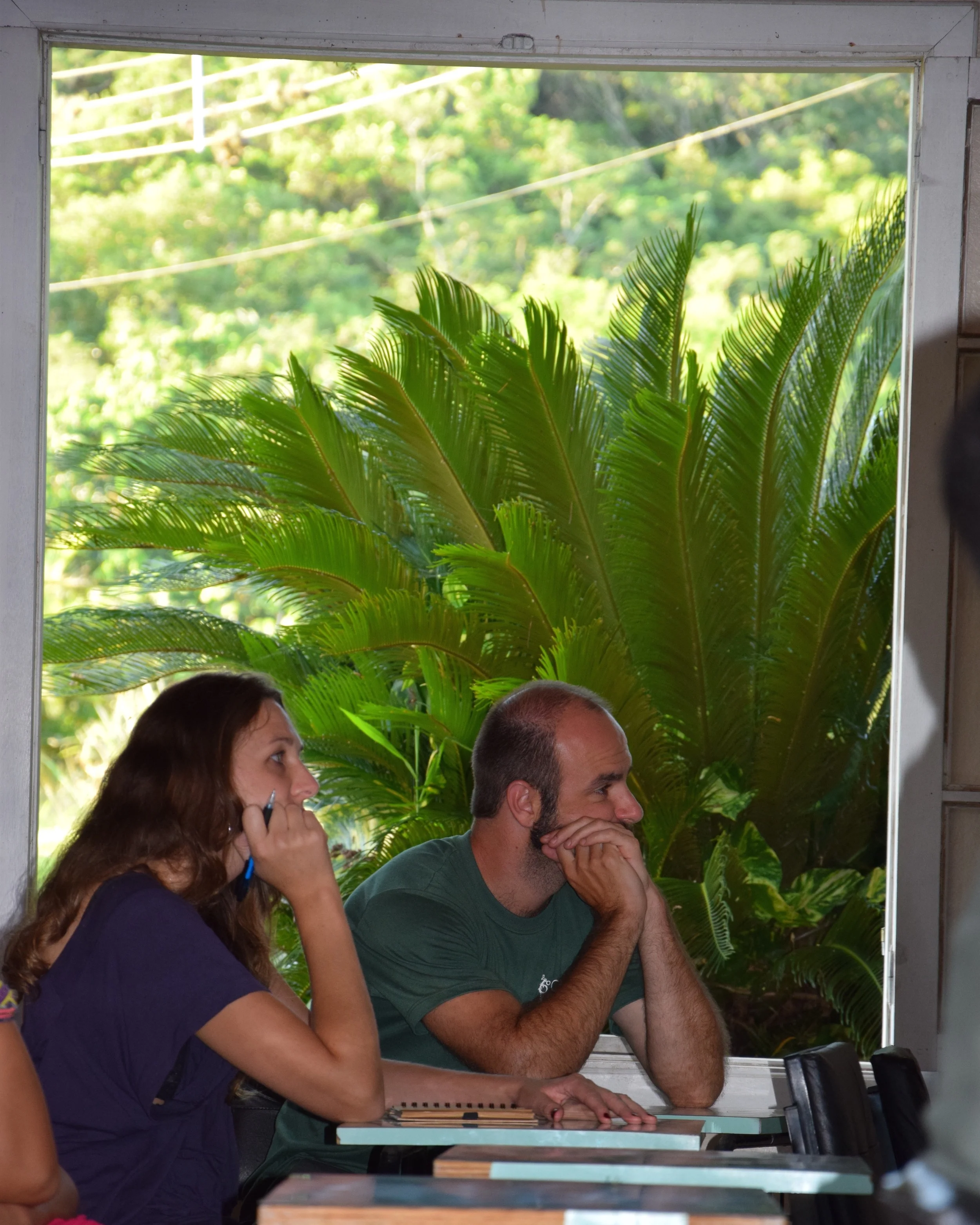 Larissa Boesing and Carlos Zucco attending a lecture.