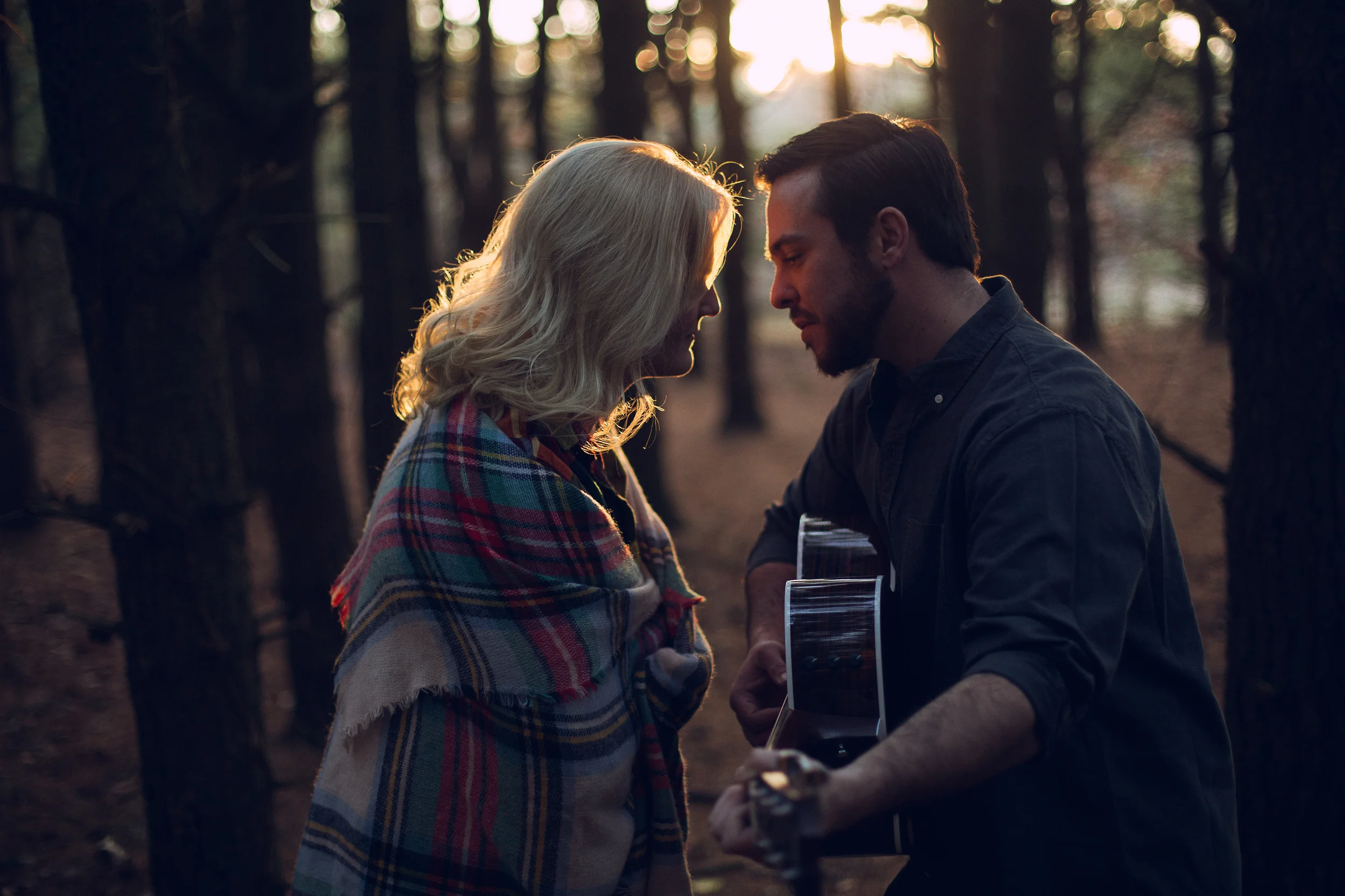 This was taken right at sunset. This perfect, golden glow can only be achieved for a few minutes, so timing is everything. Rim-lighting (the highlights on the outer edge of their heads) highlights their features and the emotion in the image.