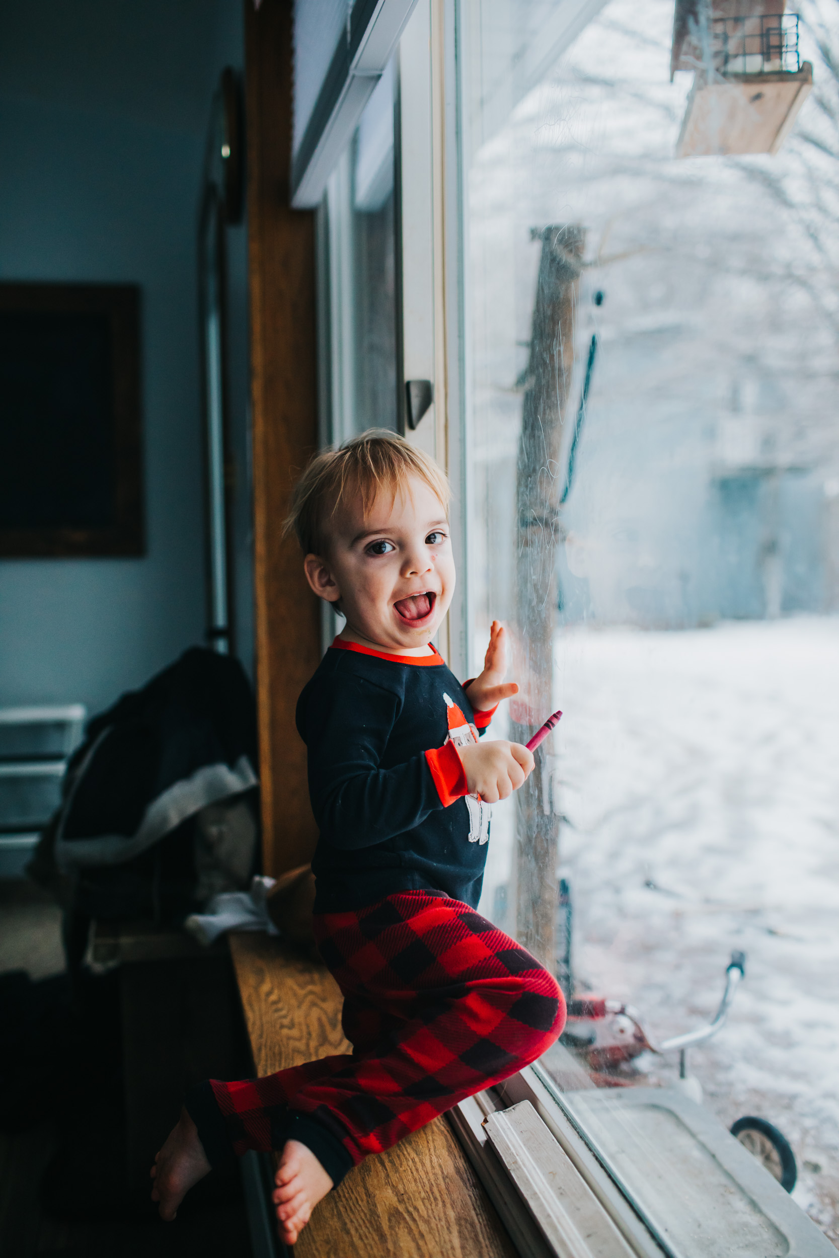 So mischievous. That giant smile on his face is because he grabbed several crayons and wrote all over the windows. If you know a good, quick way to remove crayon wax from windows, leave me a comment below. :)