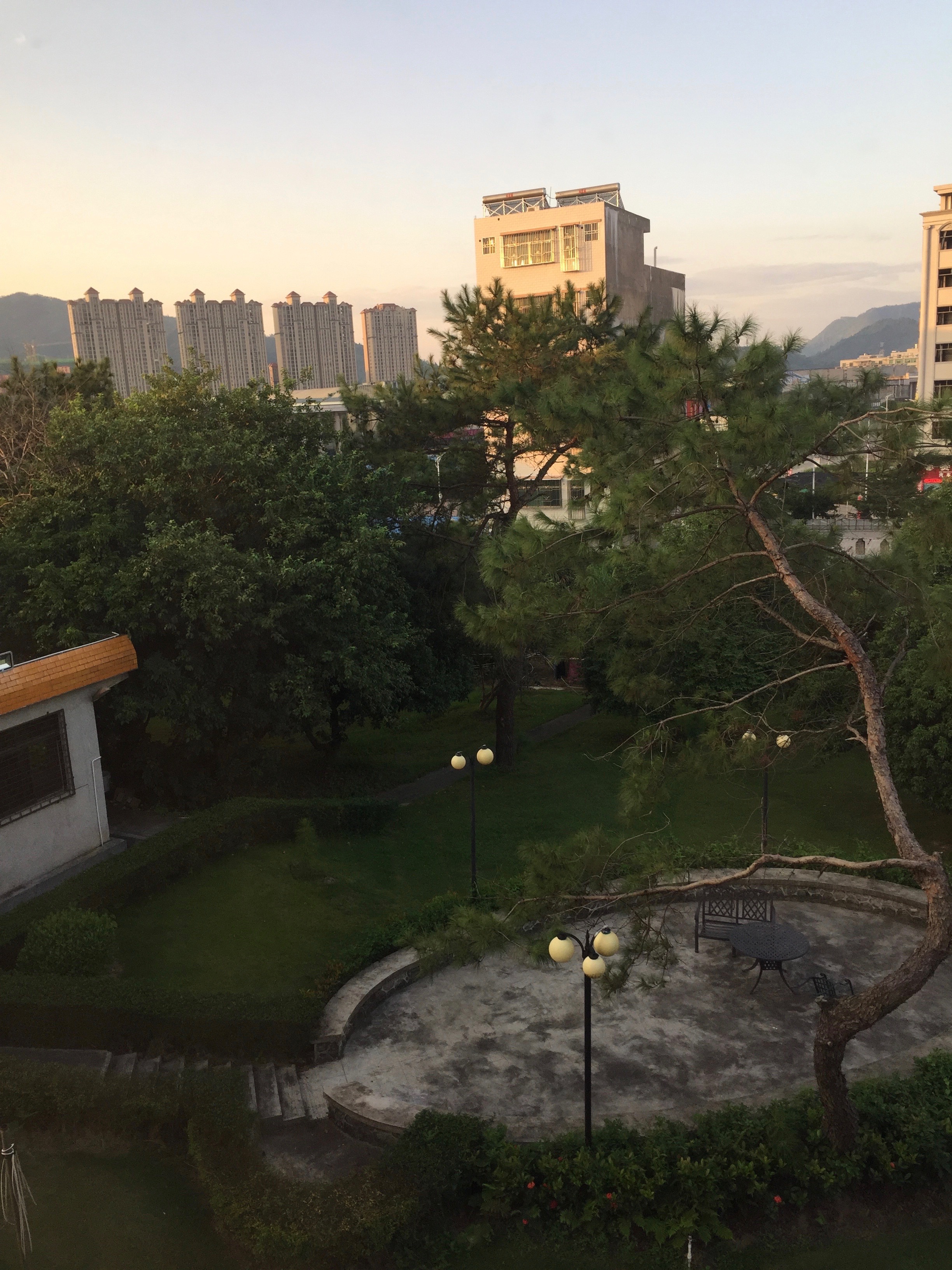 This was an early morning view from my dorm room. &nbsp;You can see the newly built high rises in Pingshan in the distance. &nbsp;The rate of construction was incredible!&nbsp; Many of these buildings sit empty as just a shells without even any wind