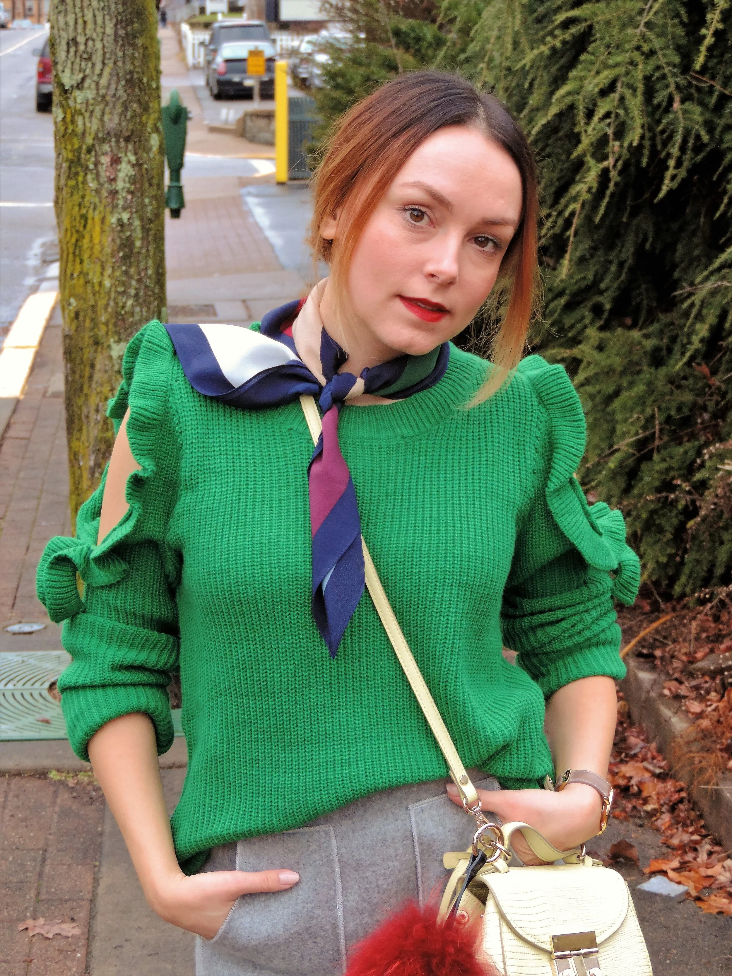 My red lip also helps to balance the green of the sweater.