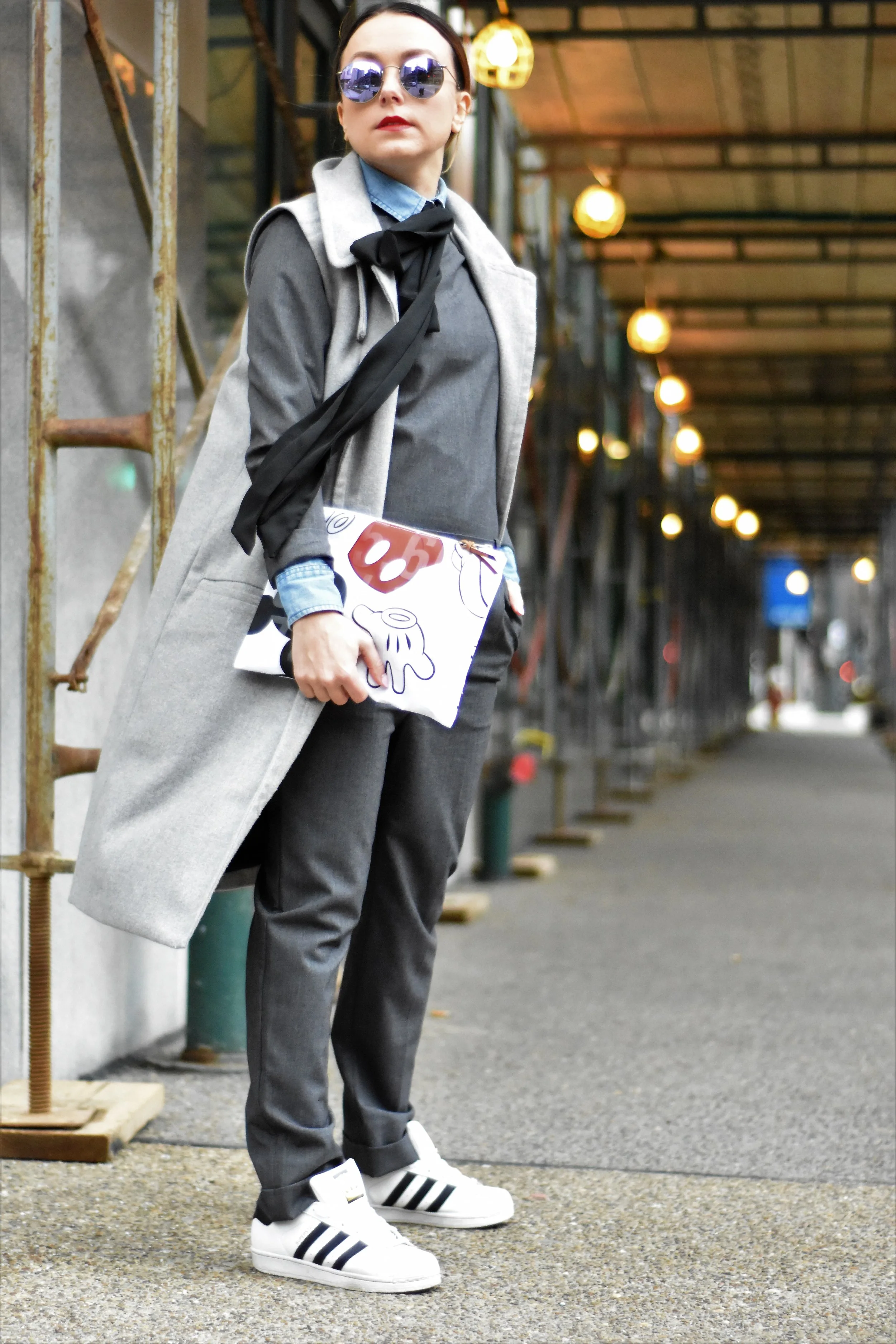 The denim layer underneath adds in another casual element to balance out the trainers. 