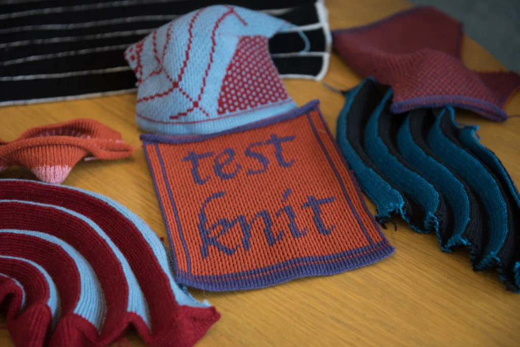 Here are some examples of Lea's knit pieces. It took 30 minutes to make the pictured blue and red piece, which is not that big. How long must it have taken to knit an entire garment? ๐ฏ