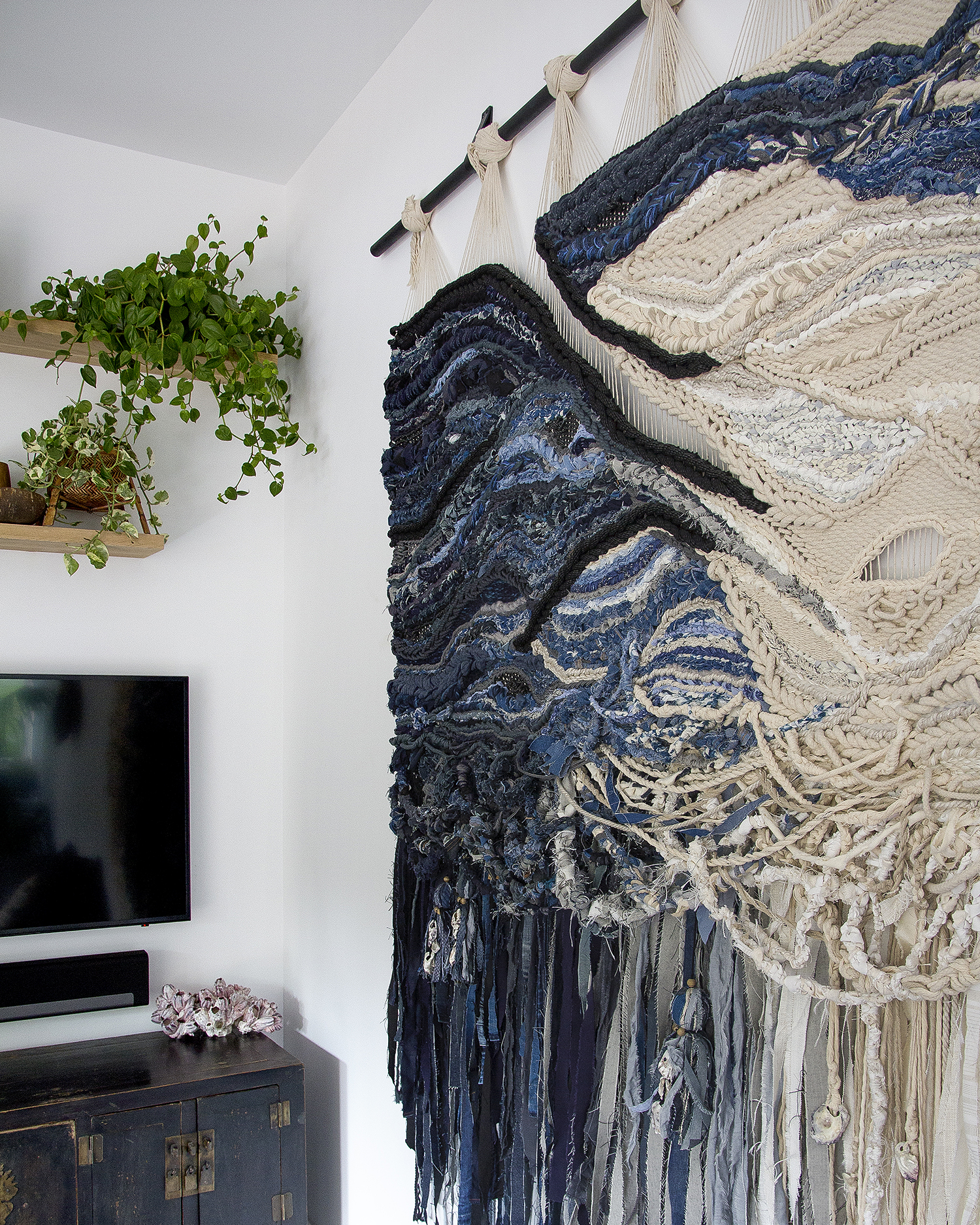 Entirely handwoven, THE DIVIDE features a carefully curated range of fibres from linen/denim/hand-dyed shibori/Merino/bamboo/Pima Cotton/leather and so much more.