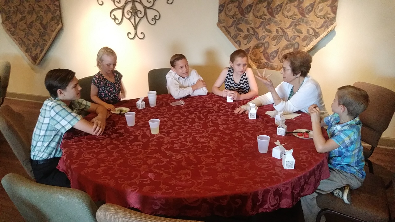 Nana holding the kids spellbound with her fight story.