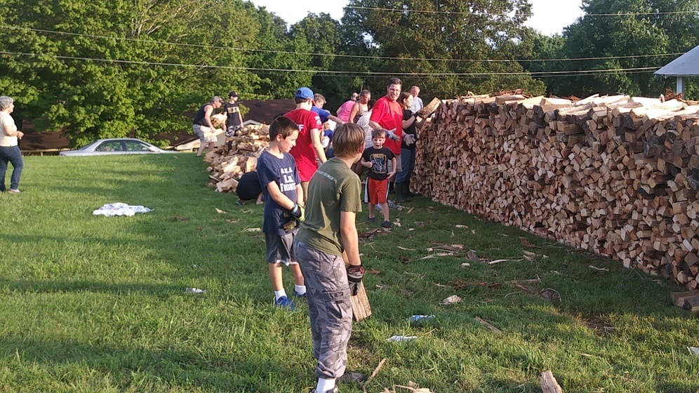  Wood stacking for St. Lawrence’s 137th Annual BBQ. 