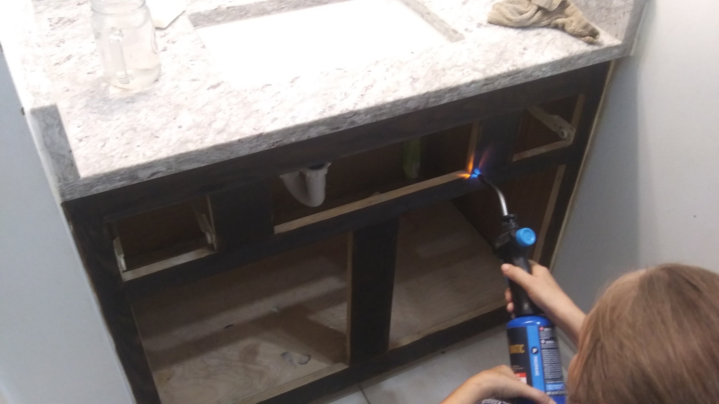  Refacing the cabinets with fire. 