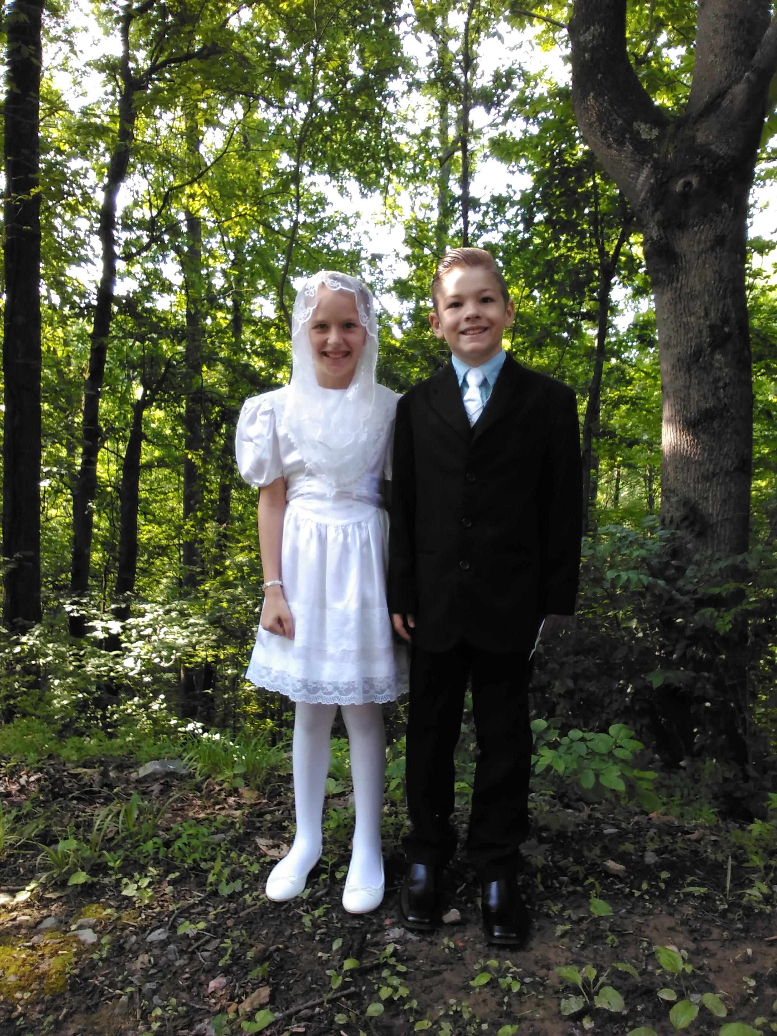 Congratulations! The twins received "First Communion"