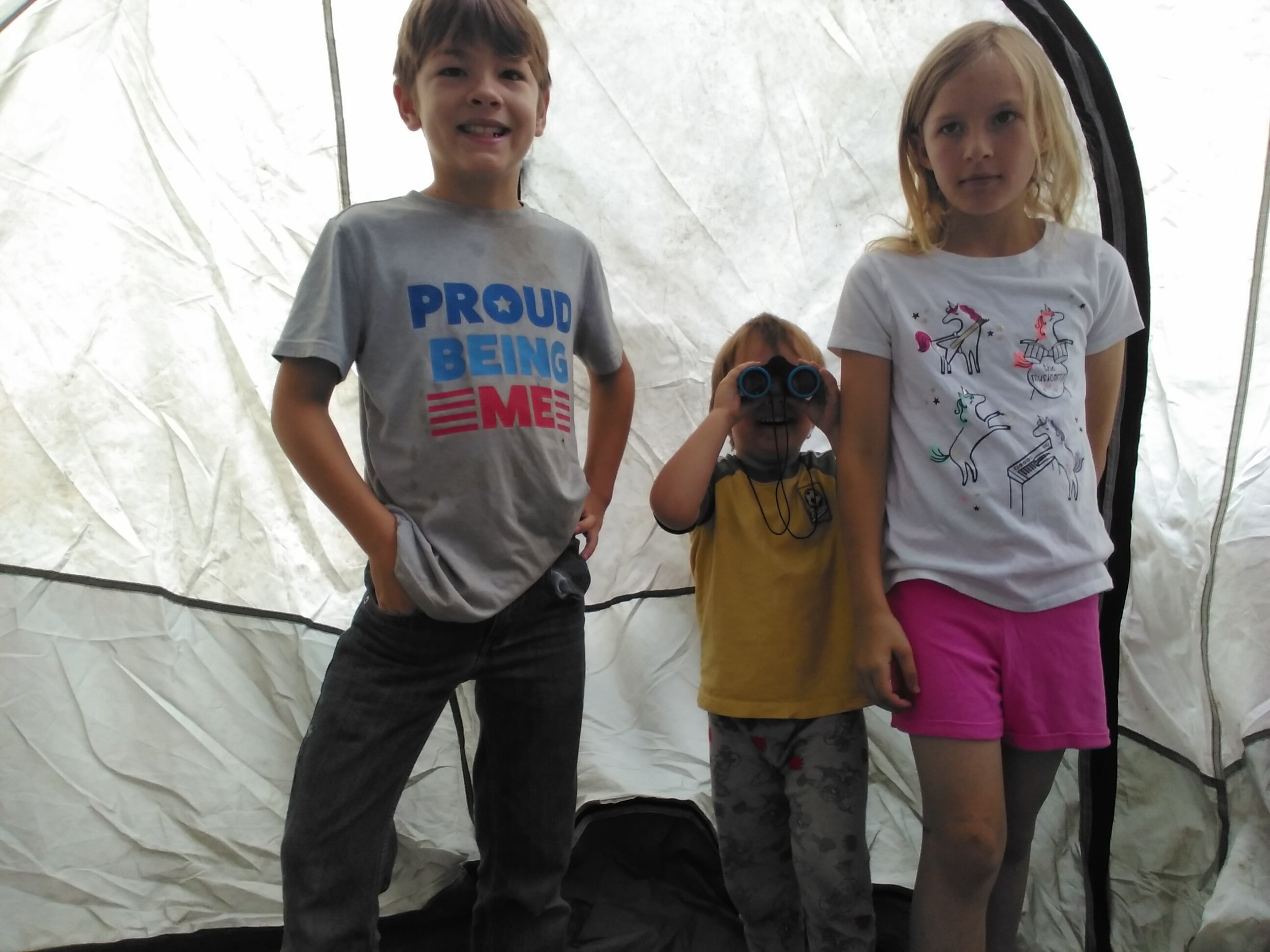 Littles camping on our back porch