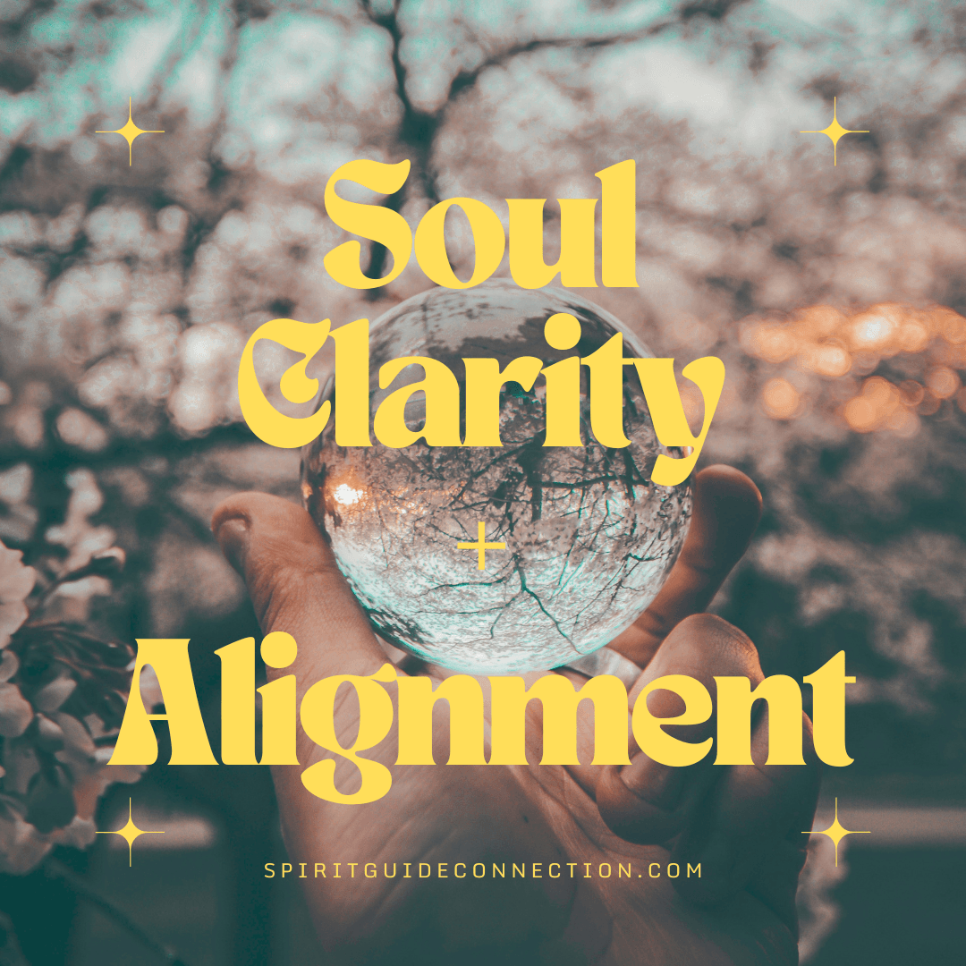 A hand holds a crystal ball with text overlay soul clarity + alignment